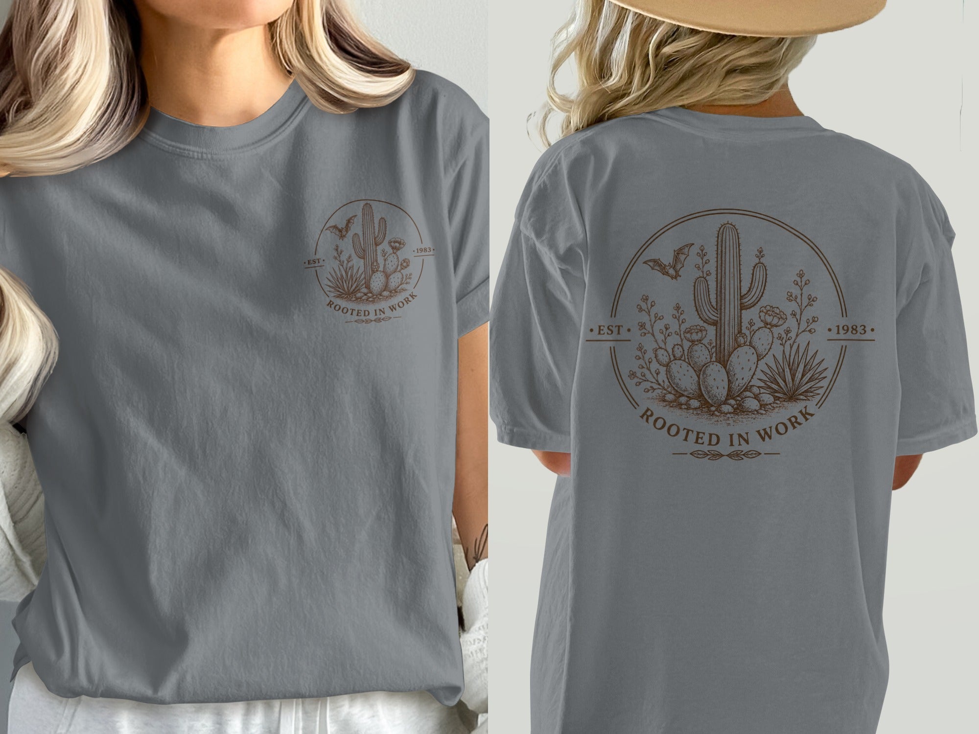 Gray shirt with brown circular graphic of cactus, plants, bat, and text "ROOTED IN WORK".