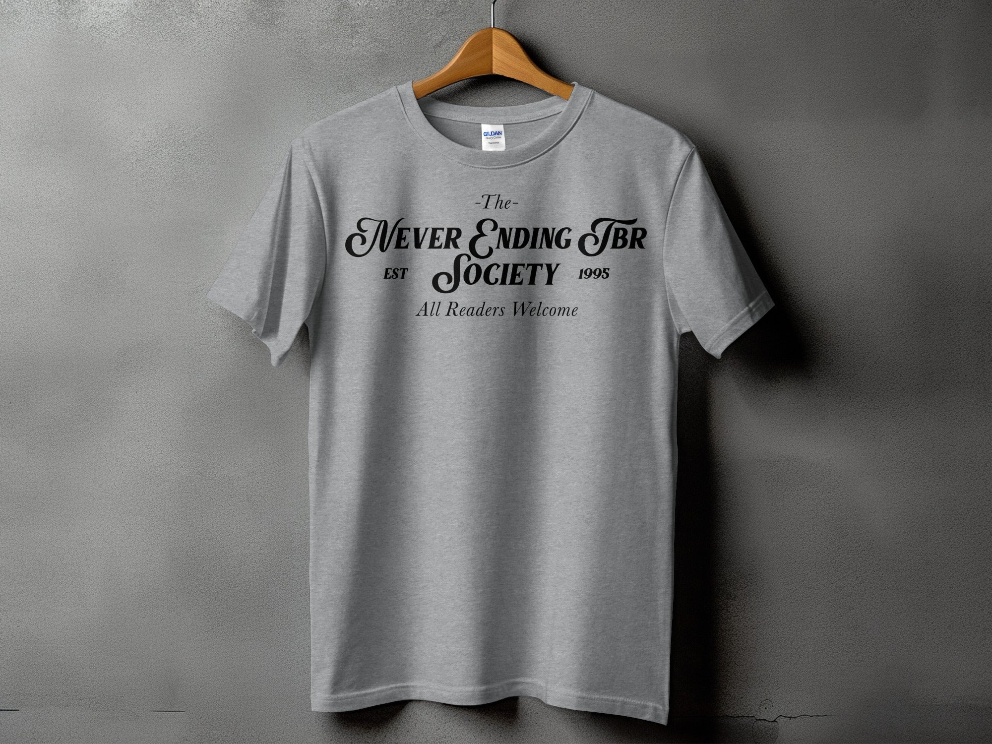 Grey t-shirt with black text: The Never Ending TBR Society est 1995, All Readers Welcome.