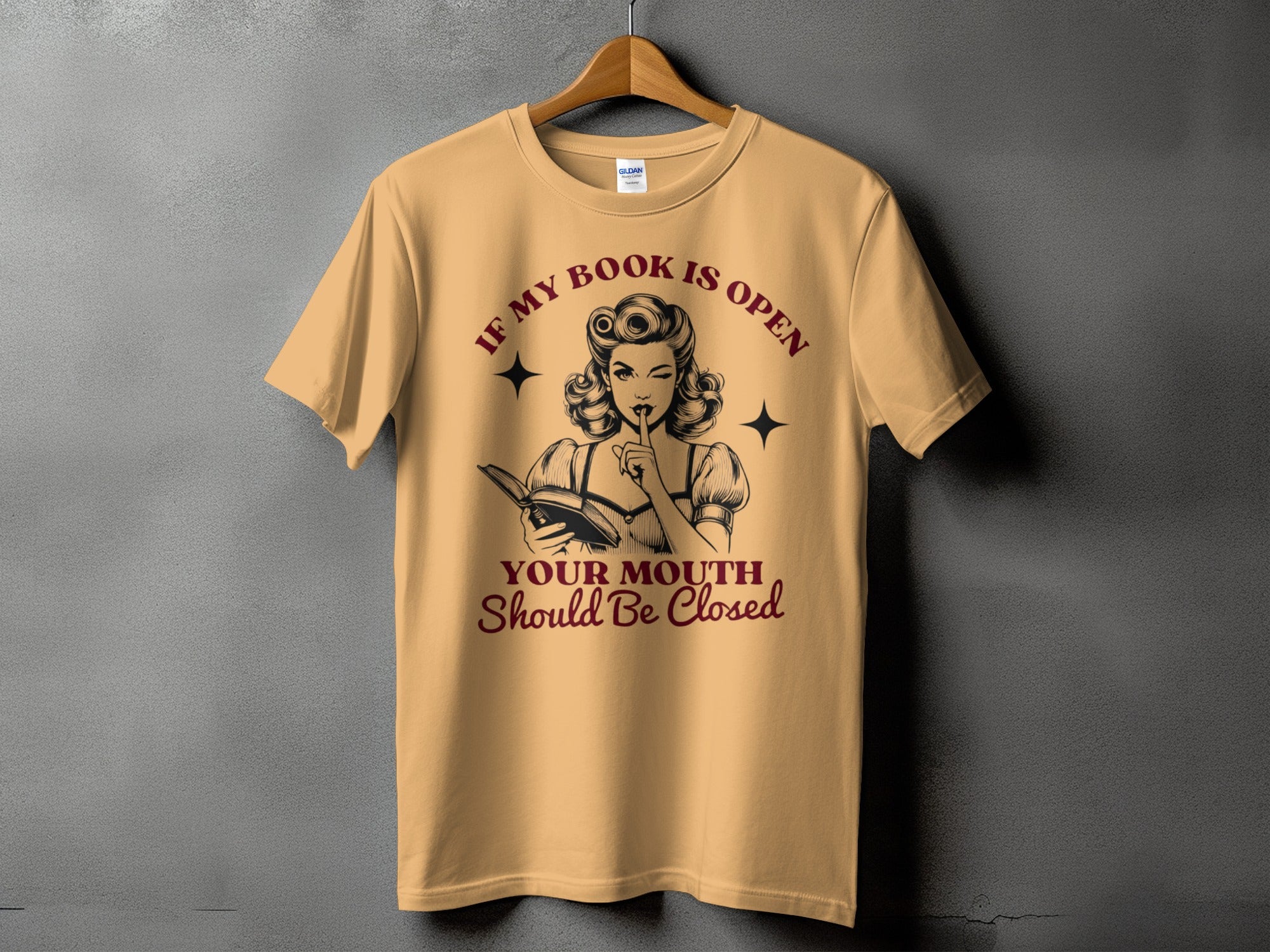 T-shirt with text "If my book is open, your mouth should be closed."
