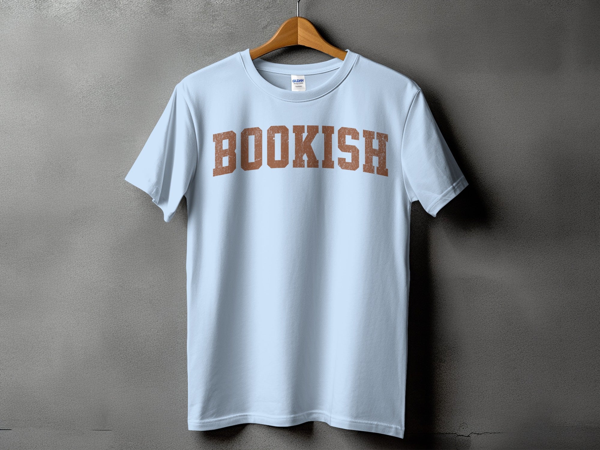 Light blue t-shirt with distressed brown "BOOKISH" lettering across the chest.