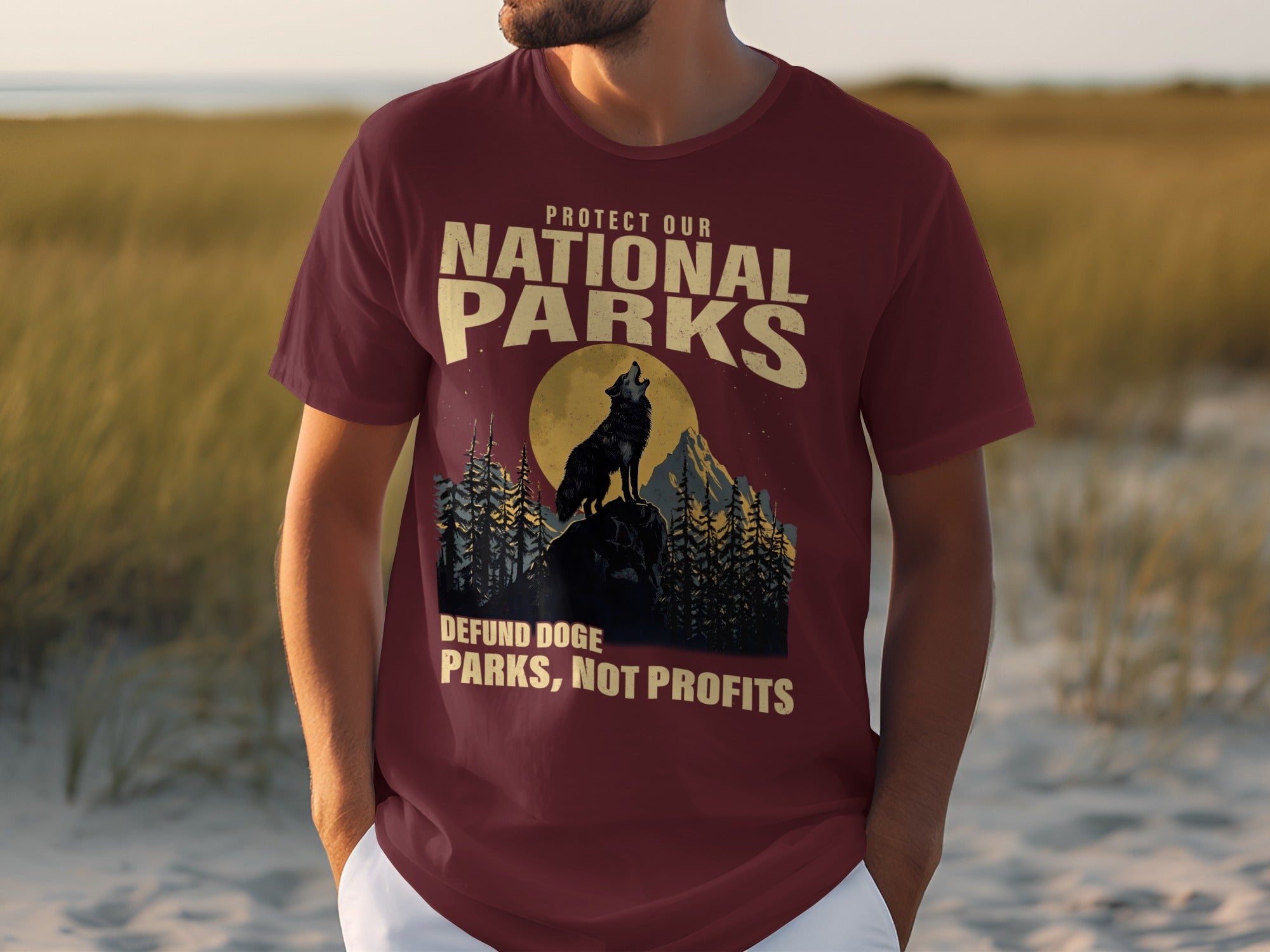 Maroon t-shirt with "Protect our National Parks" and a wolf howling at the moon.