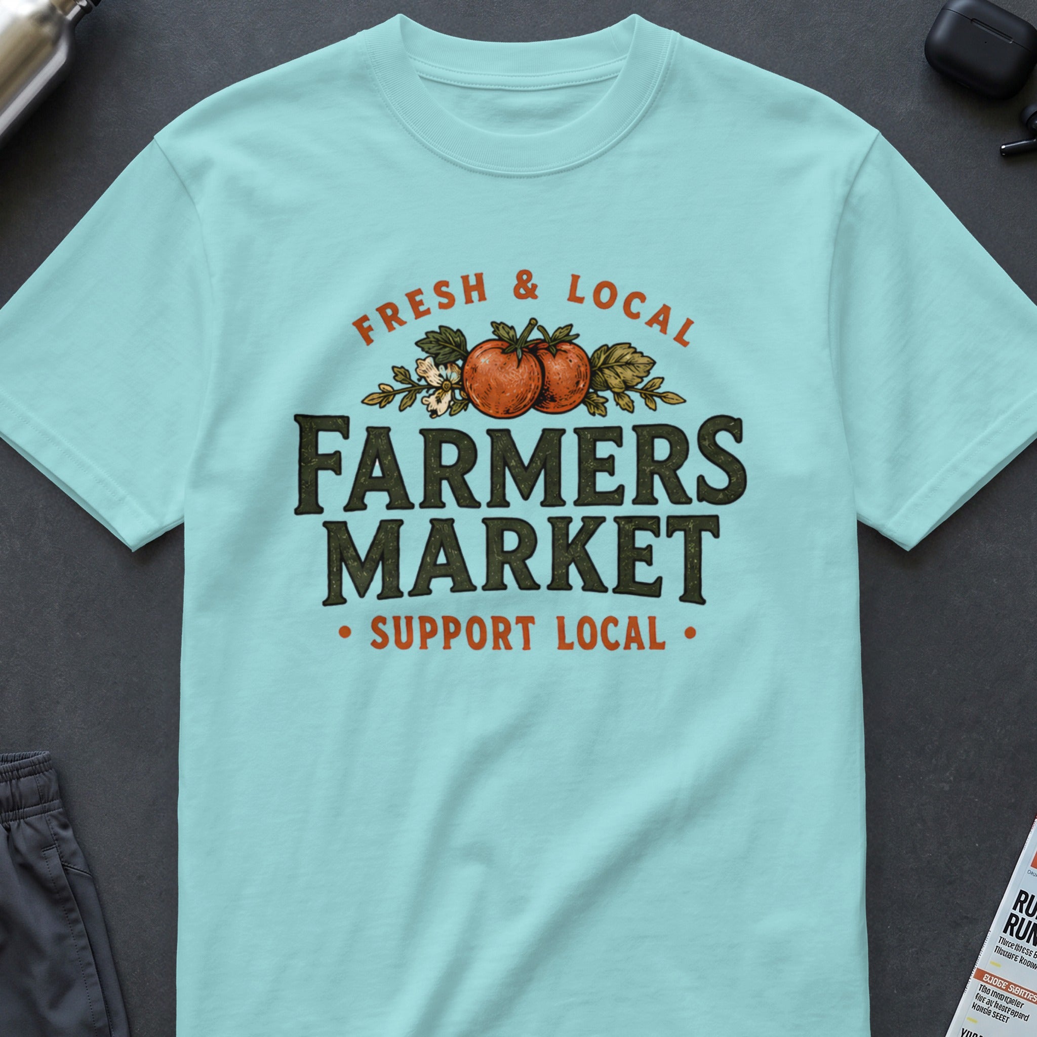 Pale blue t-shirt with "Fresh & Local Farmers Market Support Local" text and tomatoes.