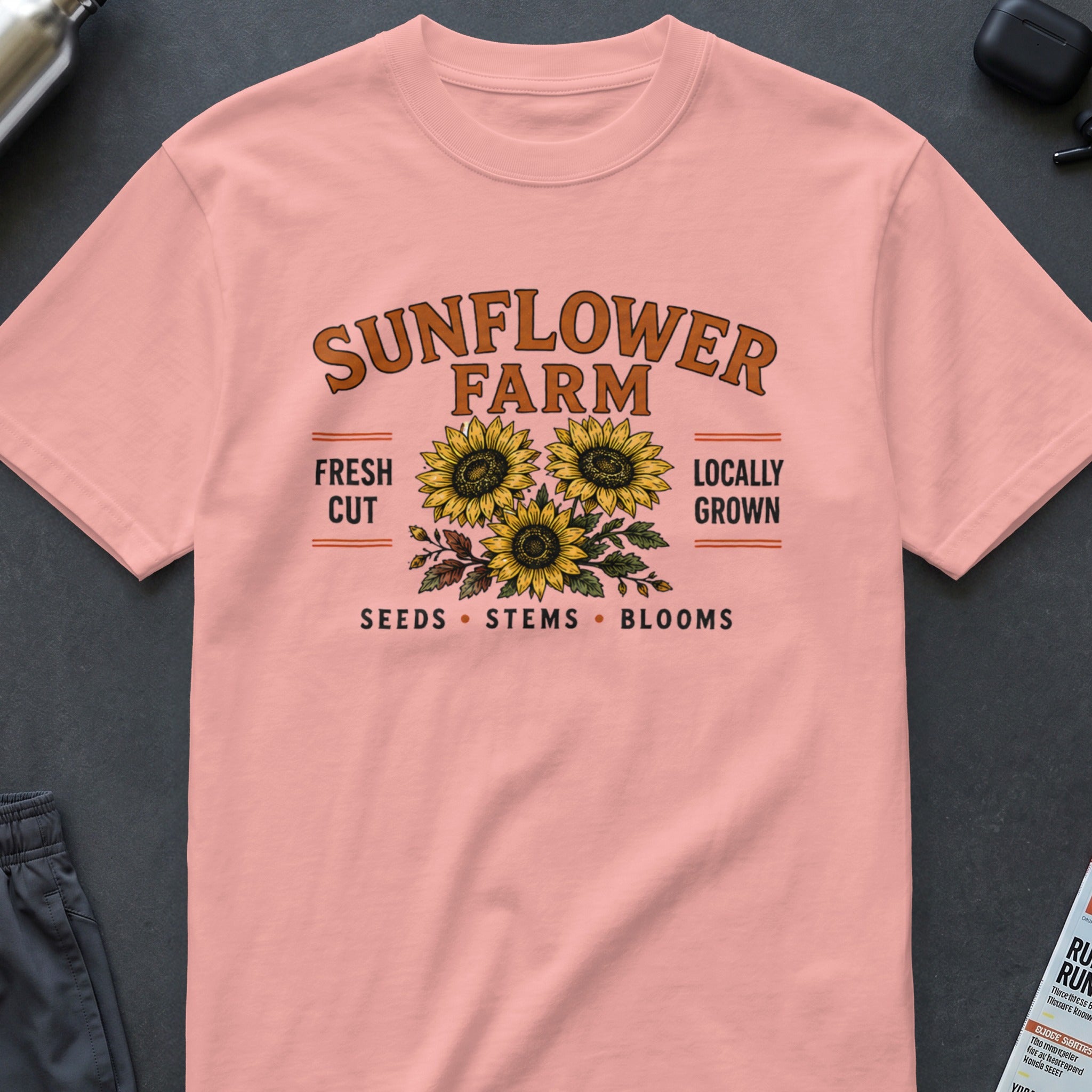 Pink t-shirt with "Sunflower Farm" text and three sunflowers.