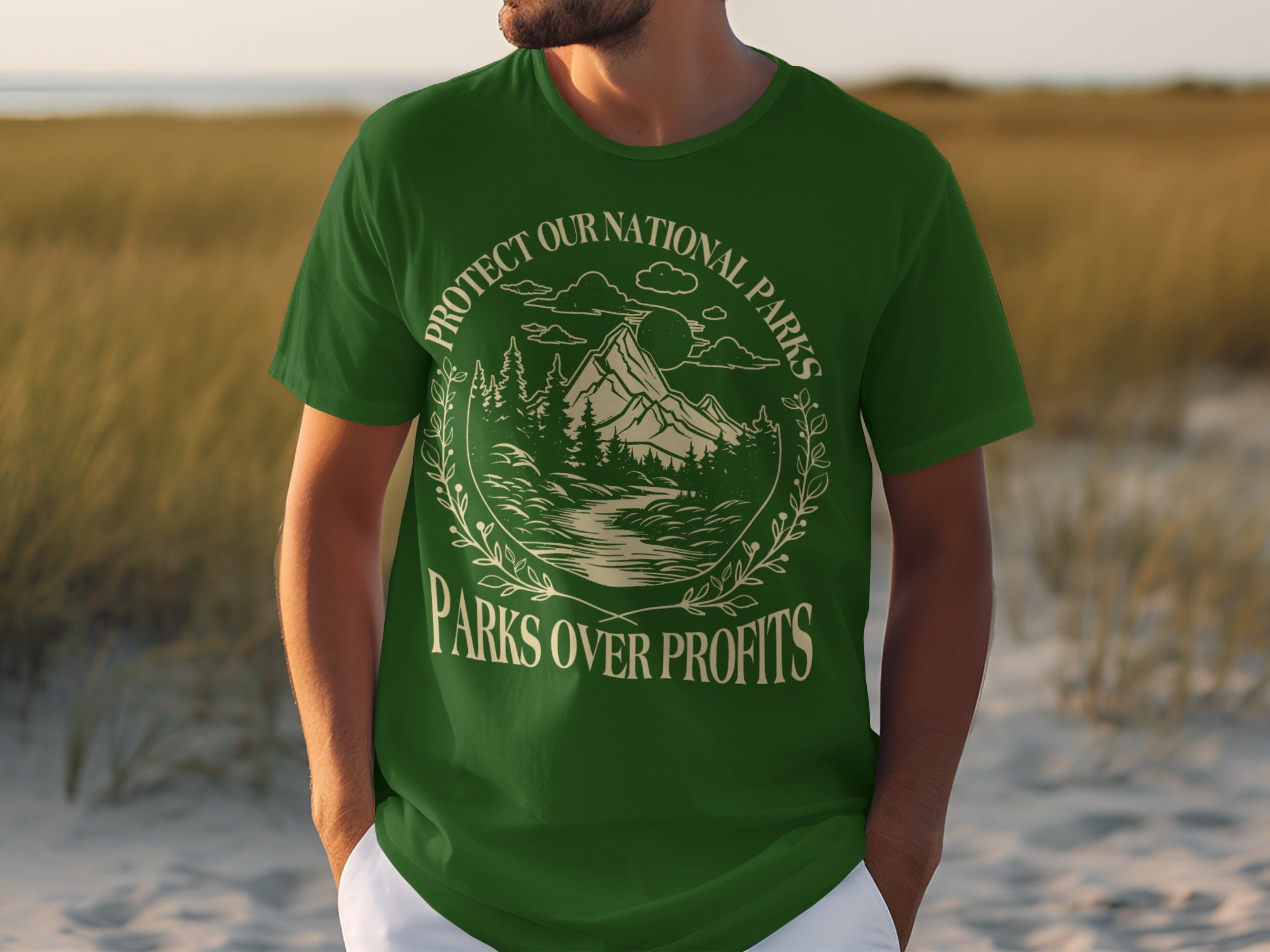 Green t-shirt with "Protect Our National Parks" and "Parks Over Profits" text and mountain design.