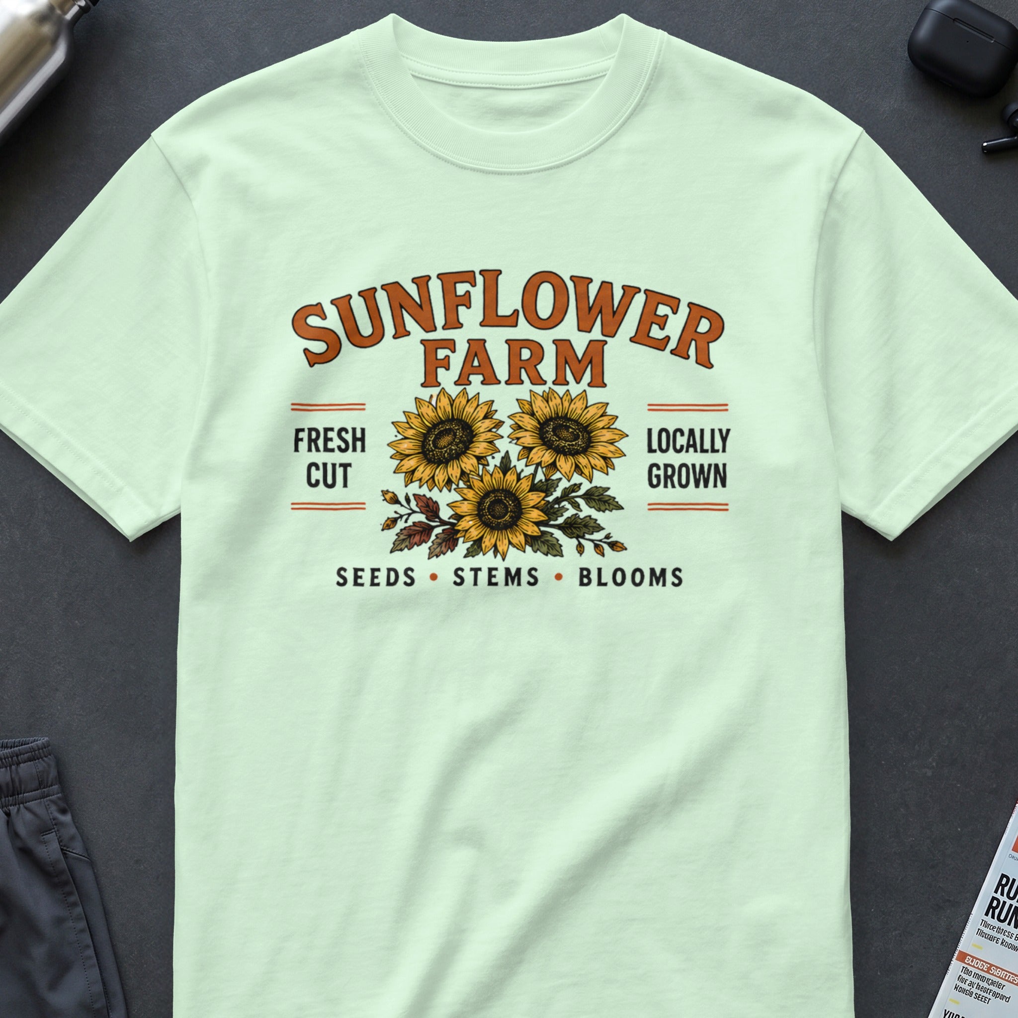 Light green t-shirt with a "Sunflower Farm" graphic featuring sunflowers and text.