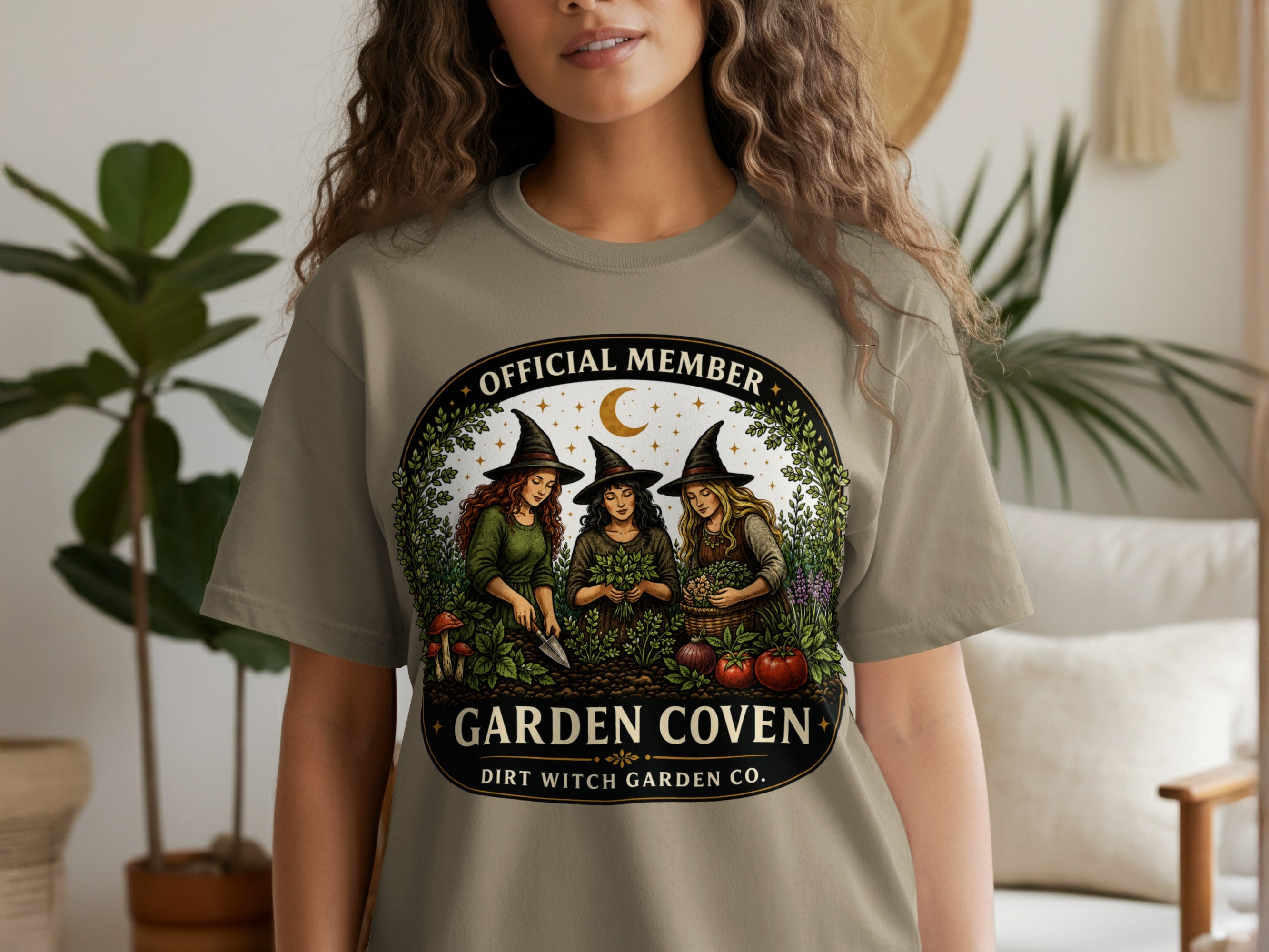 Three witches gardening under a crescent moon, "Garden Coven Dirt Witch Garden Co." text.