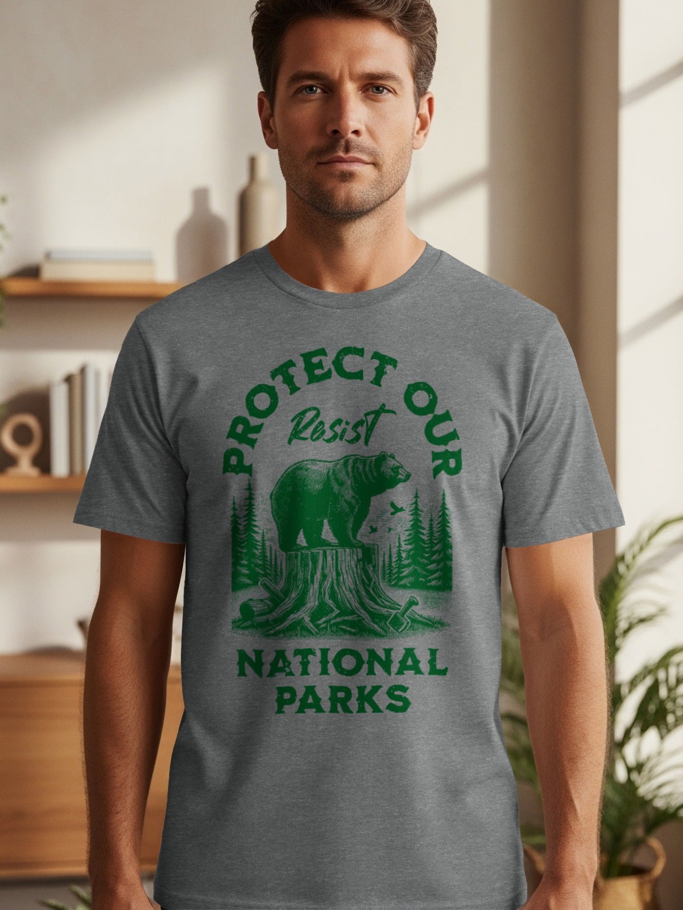 Men's grey t-shirt with green "Protect Our National Parks" text and bear graphic.