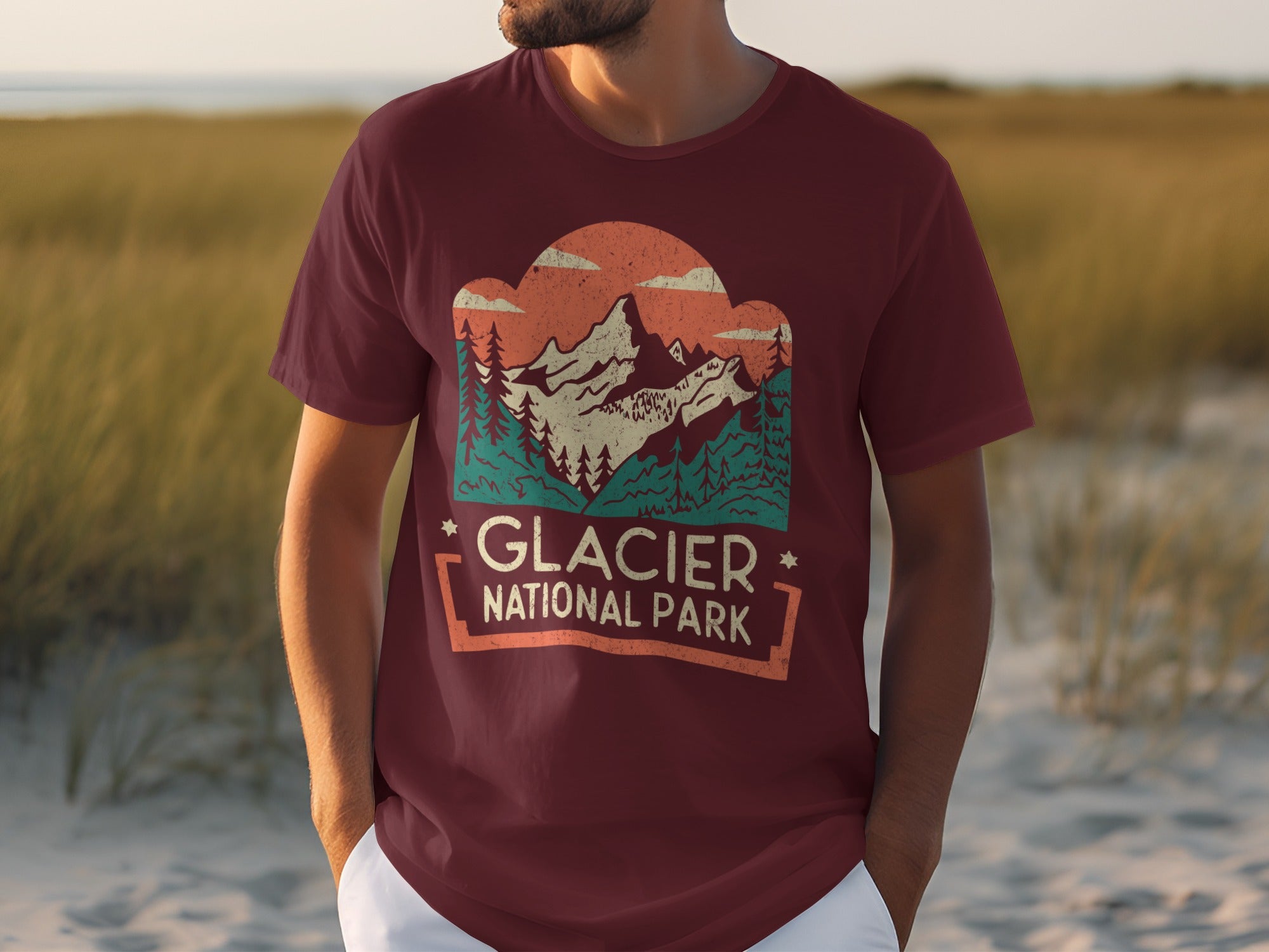 T-shirt with Glacier National Park graphic featuring mountains, trees, and text.