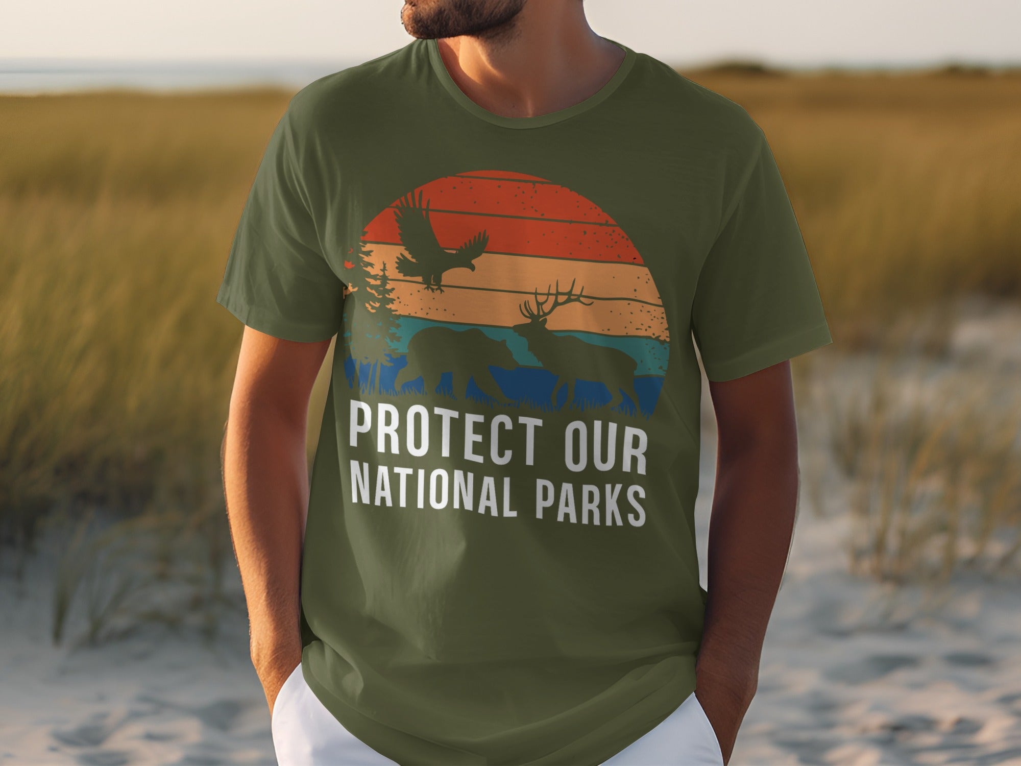Green t-shirt with "Protect Our National Parks" text and wildlife graphic.