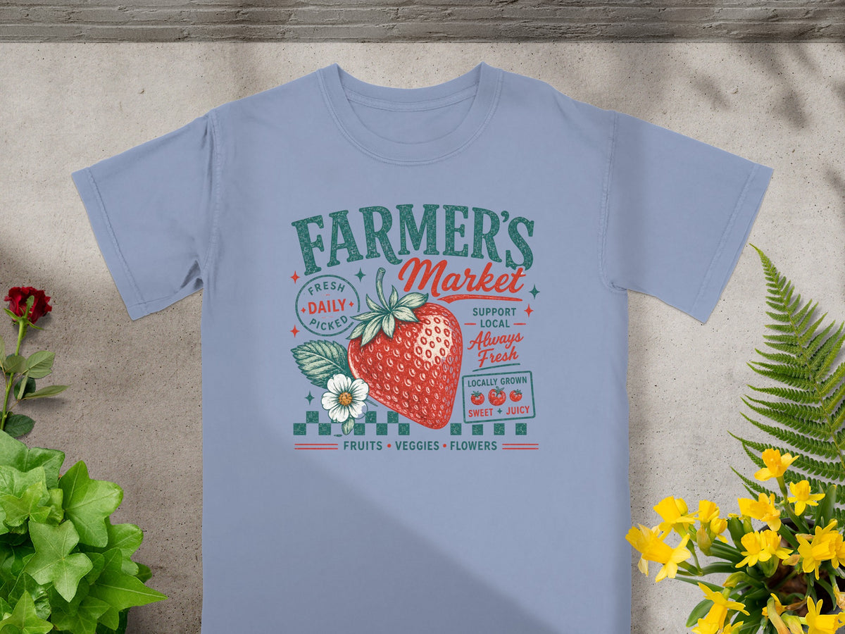 Light blue t-shirt with Farmer's Market graphic featuring a strawberry.