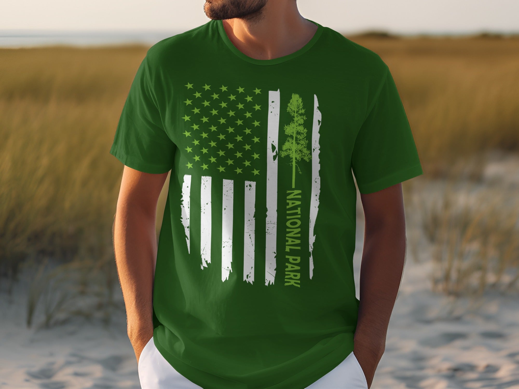 Green t-shirt with tattered flag design, tree, and "NATIONAL PARK" text.