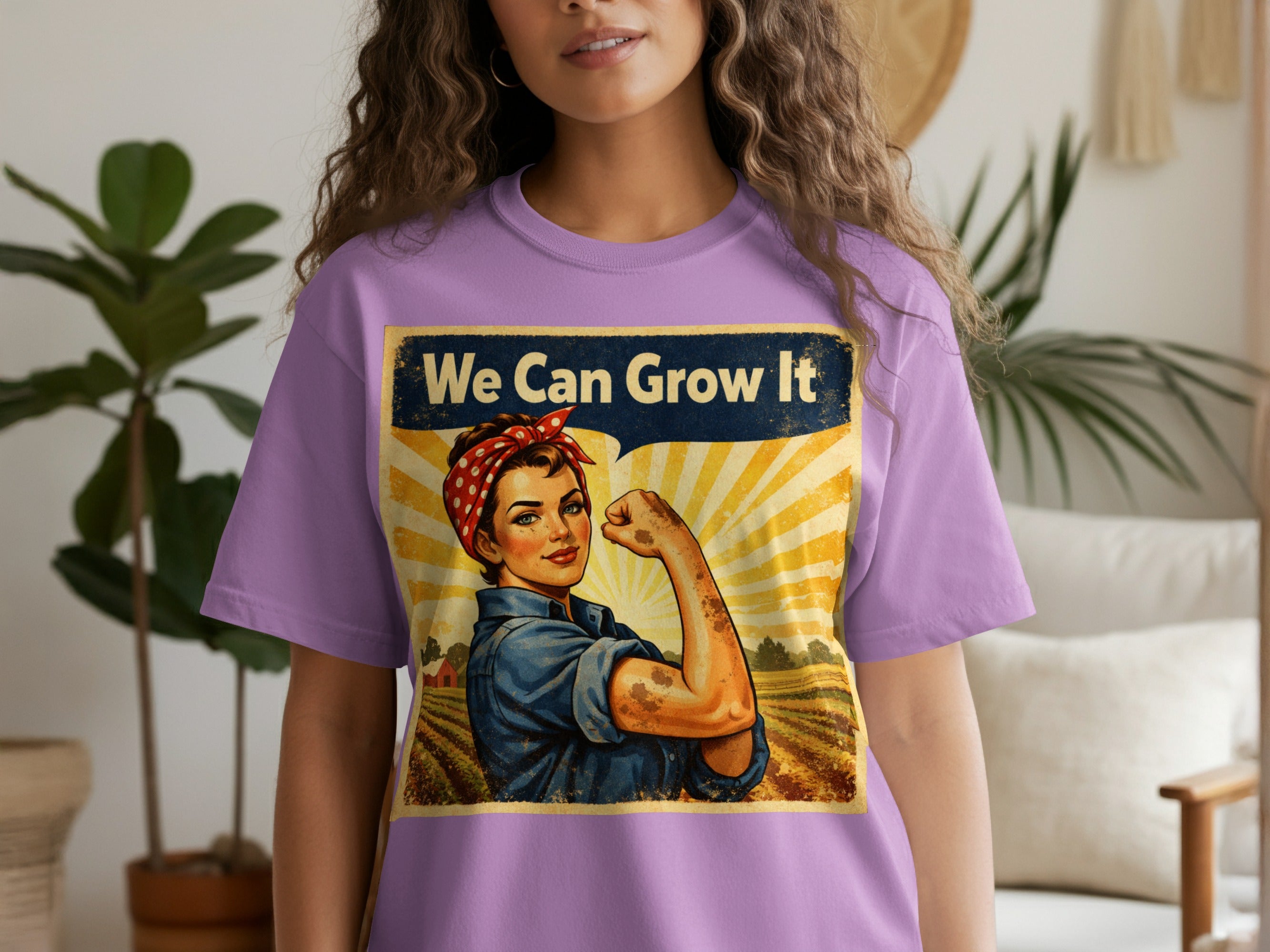 T-shirt featuring Rosie the Riveter pose with text "We Can Grow It".
