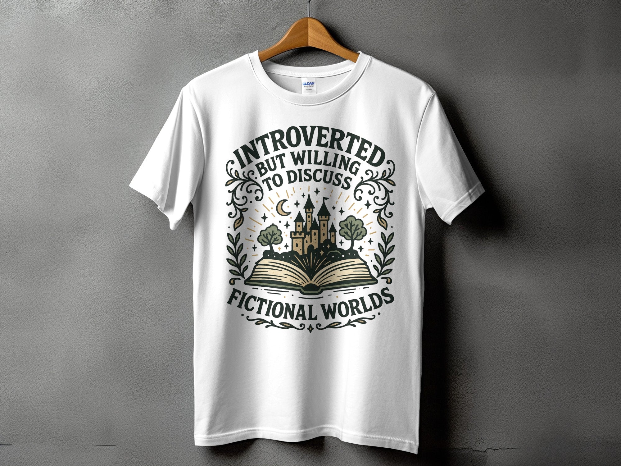 White t-shirt with "Introverted but willing to discuss fictional worlds" text and book graphic.