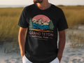 Black t-shirt with Grand Teton National Park graphic featuring mountains and trees.