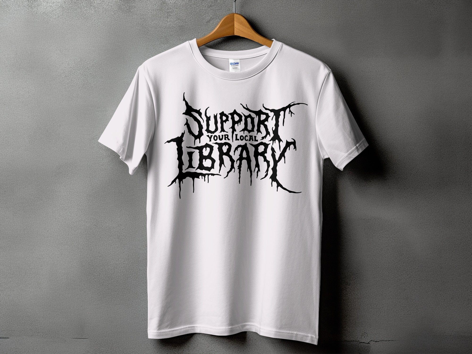 White t-shirt with black dripping text that says "Support Your Local Library."