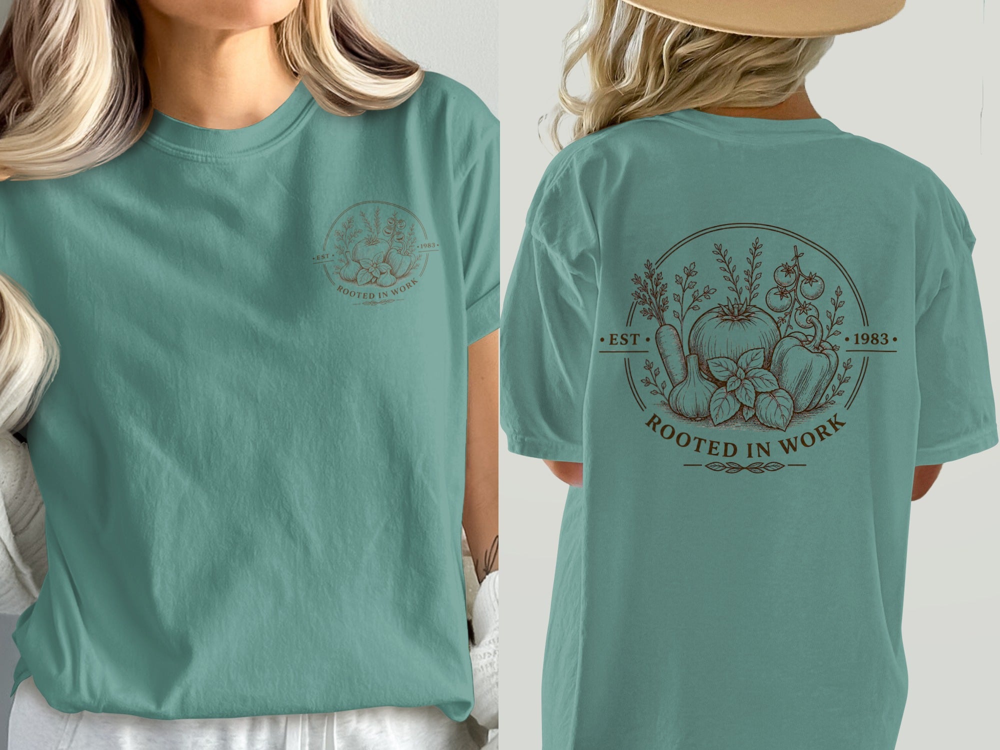 Teal t-shirt with brown circular graphic featuring vegetables and text "EST. ROOTED IN WORK 1983."