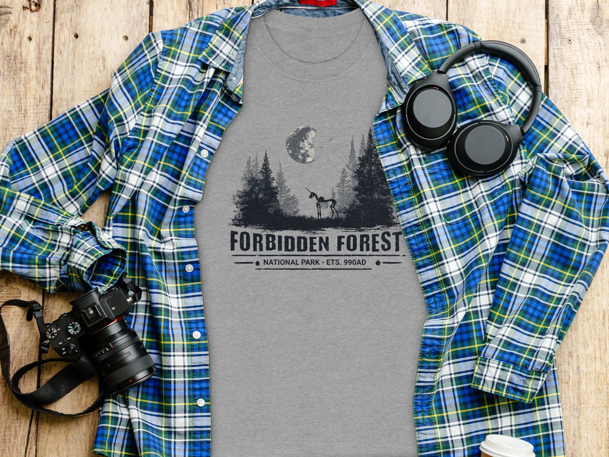 Gray t-shirt with Forbidden Forest National Park graphic and a skeleton unicorn.