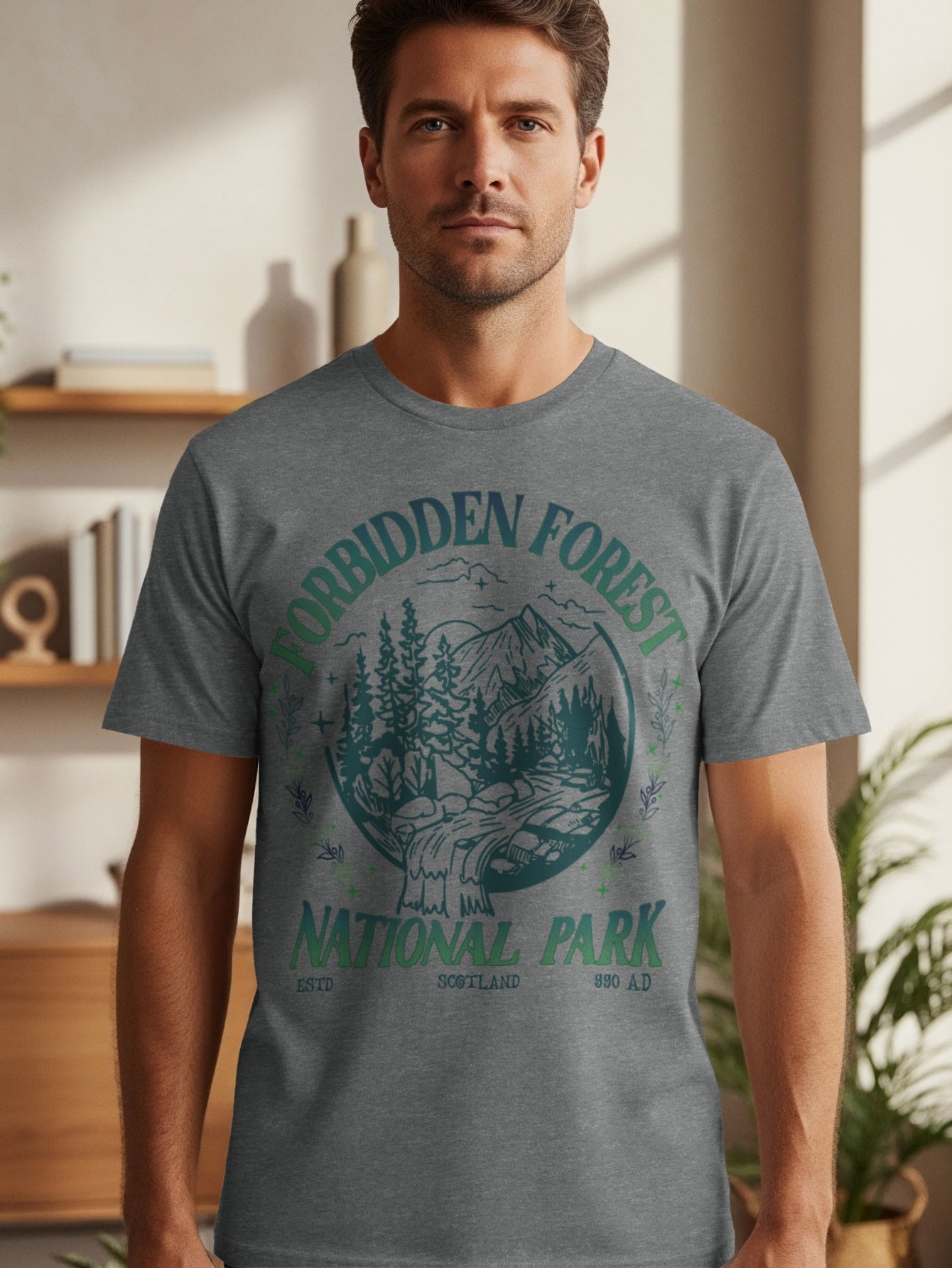 Gray t-shirt with circular nature graphic: "Forbidden Forest National Park Scotland".