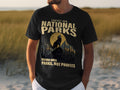 Black t-shirt with "Protect Our National Parks" and wolf graphic.