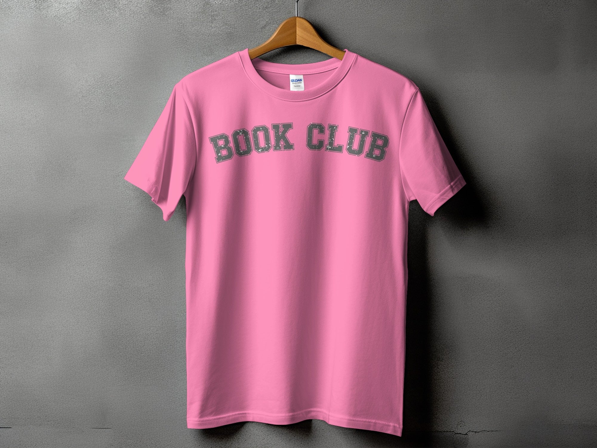 Pink t-shirt with distressed grey "BOOK CLUB" text on the front.