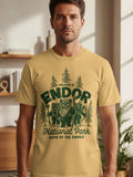 Yellow t-shirt with green Endor National Park Ewok graphic and text.