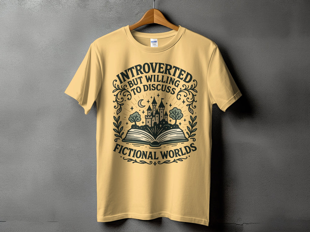 Yellow t-shirt with "Introverted but willing to discuss fictional worlds" text and castle graphic.