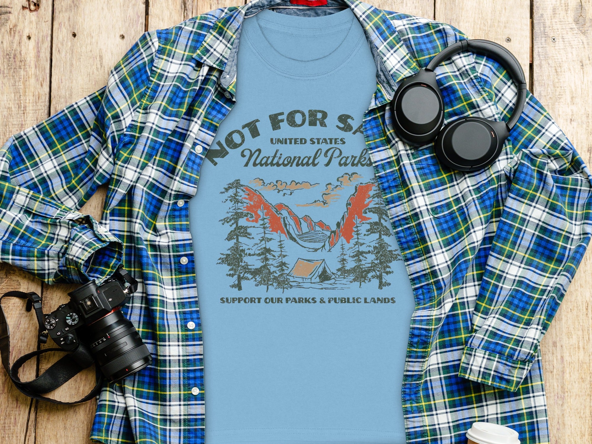 Blue t-shirt with "United States National Parks" graphic and camping scene.