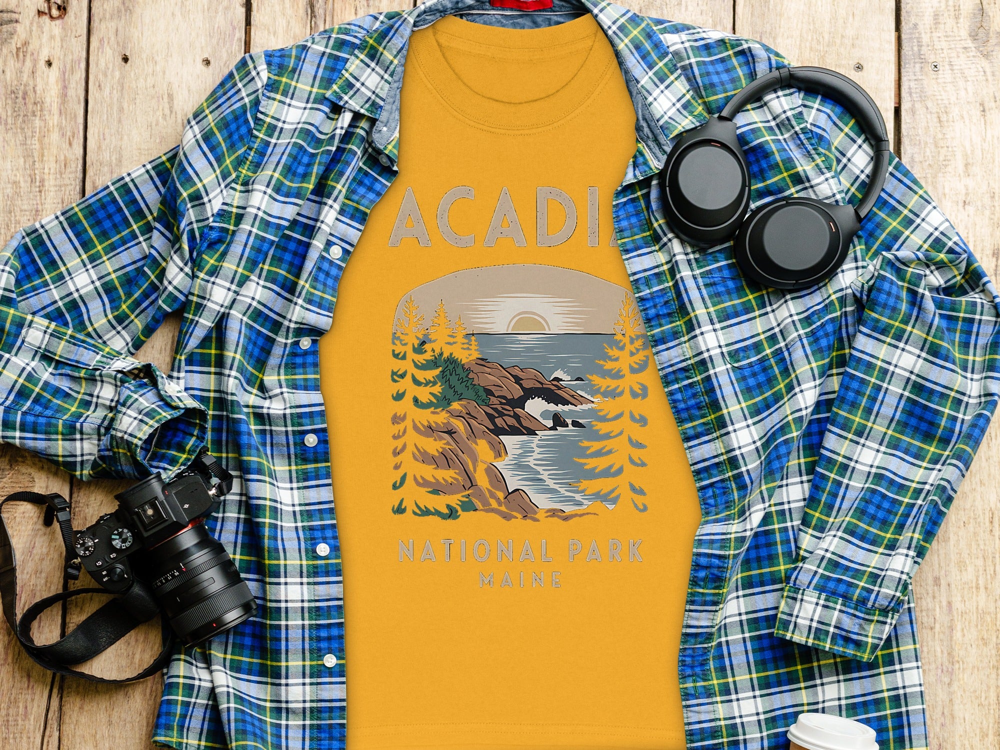 Yellow t-shirt with "Acadia National Park Maine" graphic and scenic art.