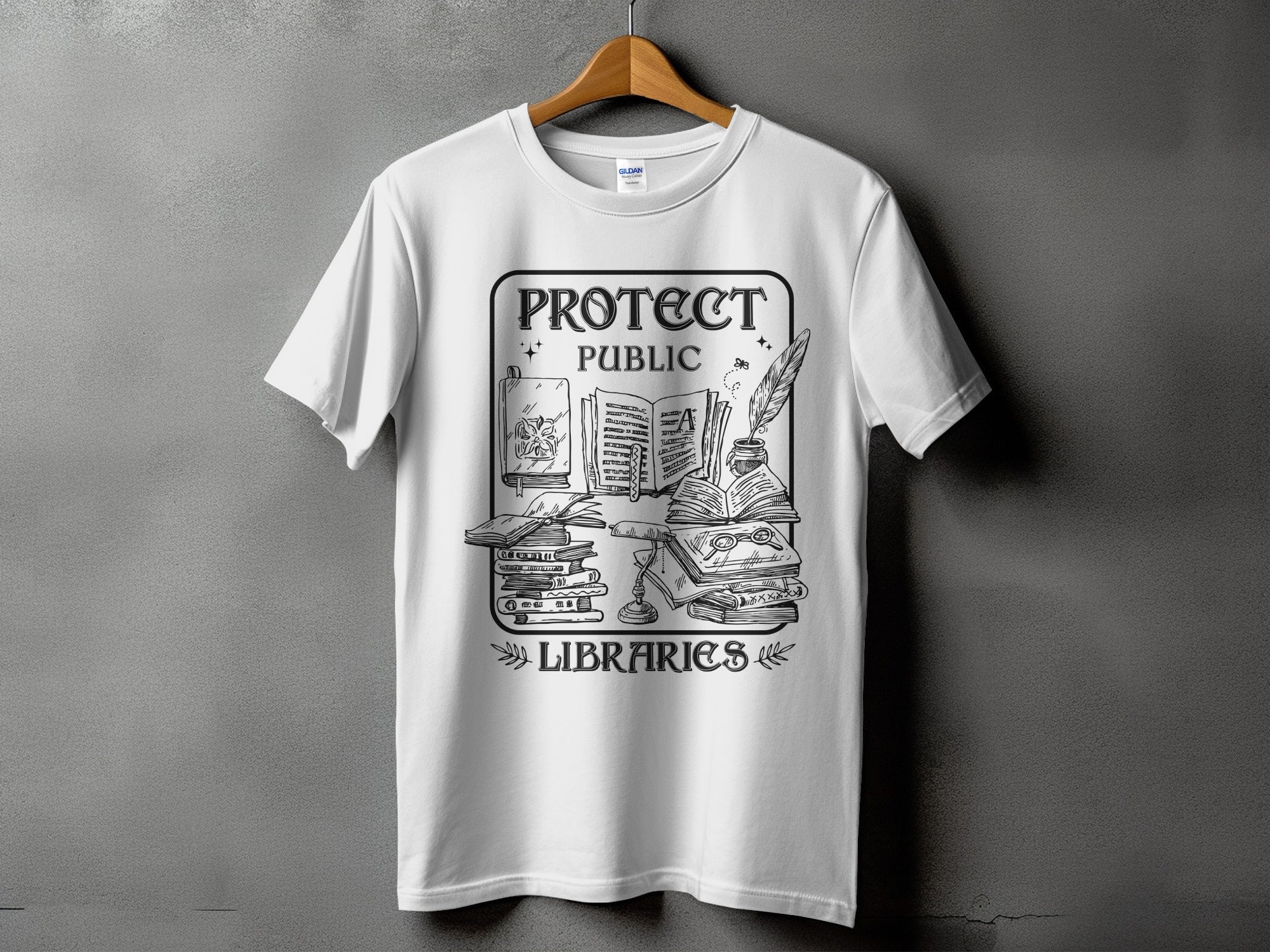 White t-shirt with "PROTECT PUBLIC LIBRARIES" text and sketch of books, lamp, and quill.