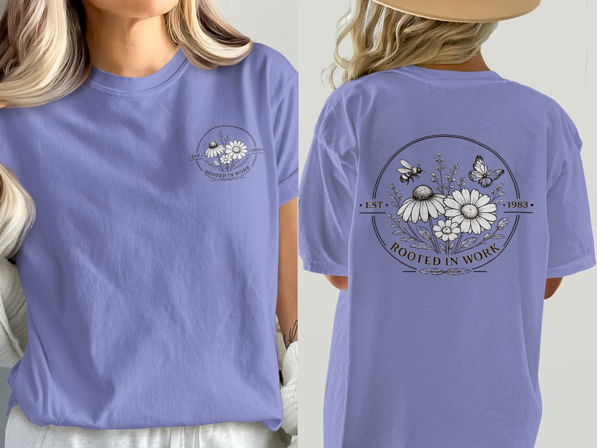 Purple t-shirt with circular floral design and "ROOTED IN WORK EST. 1983" text.