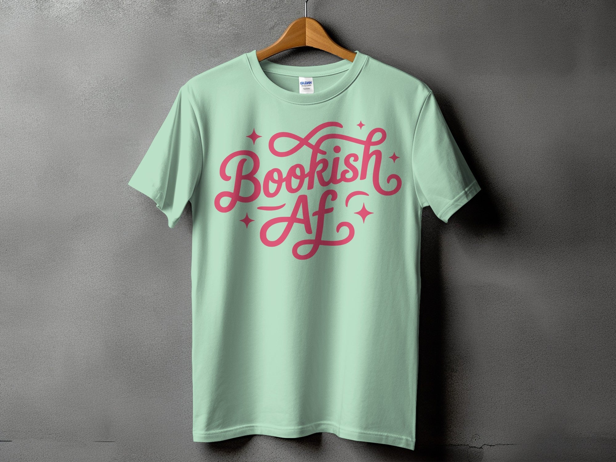 Light mint t-shirt with pink "Bookish AF" text and stars.
