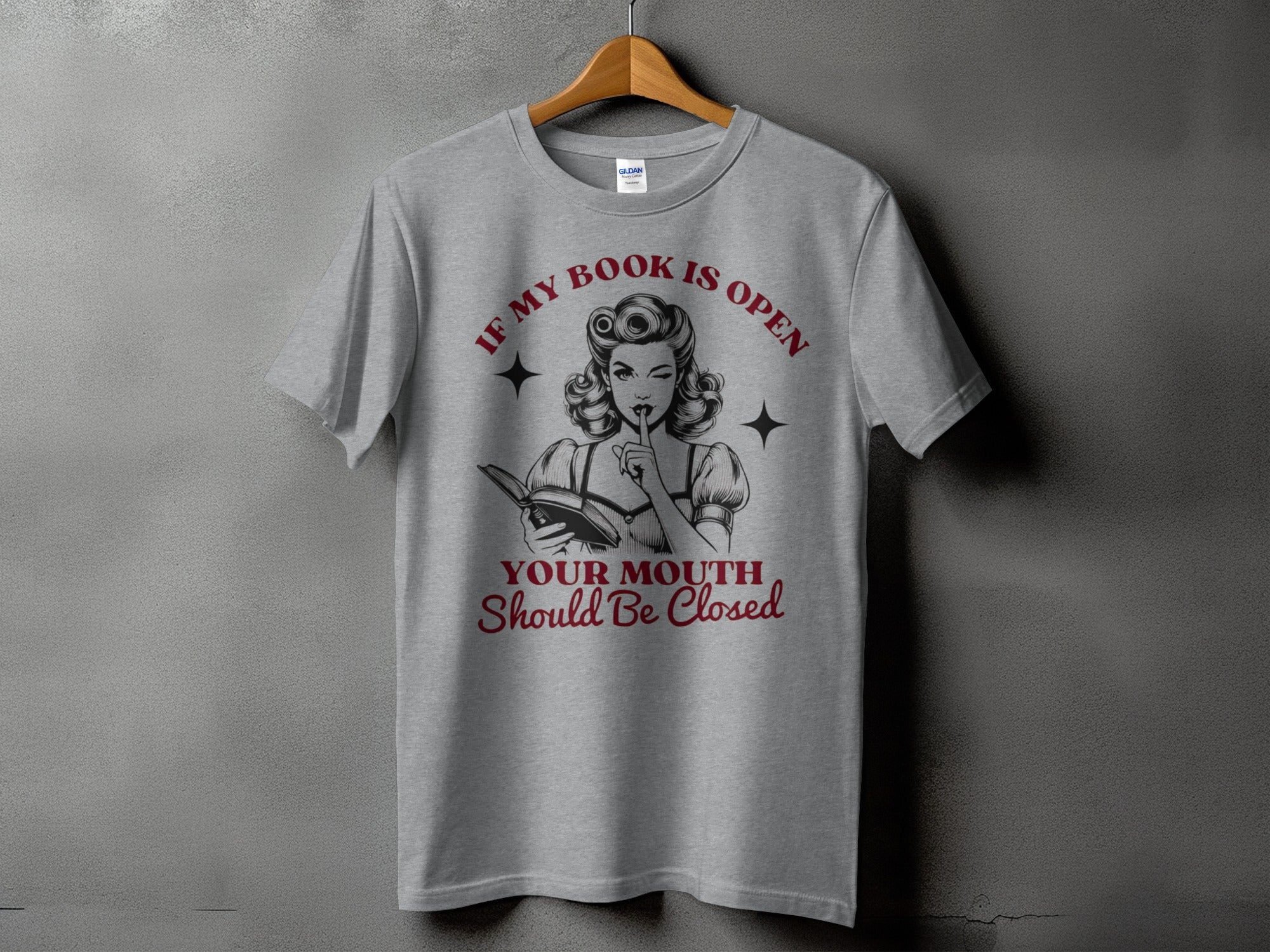 Gray t-shirt with vintage woman holding book and text "If My Book is Open Your Mouth Should Be Closed".