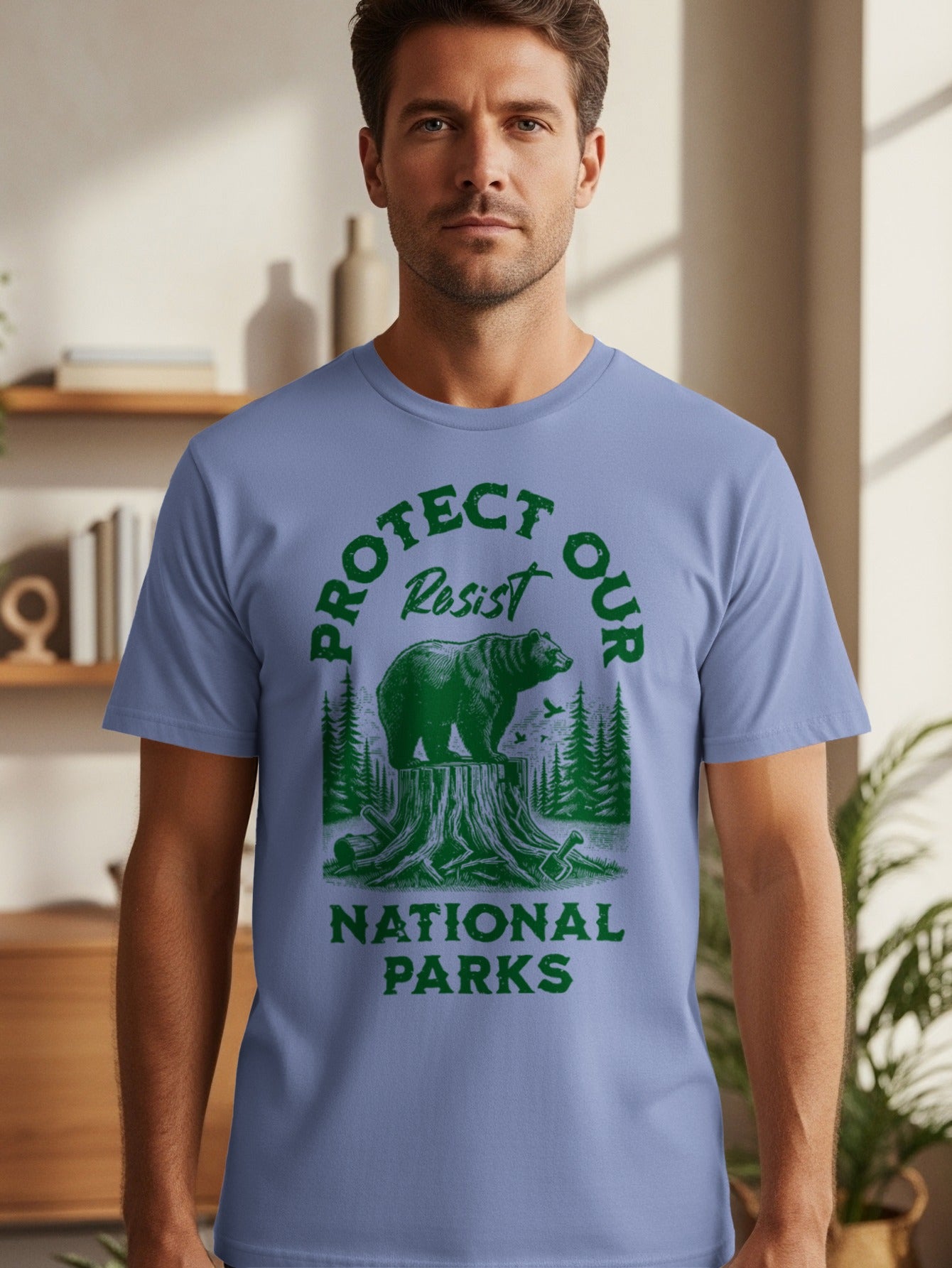 T-shirt with green graphic: "Protect Our National Parks" slogan, bear on tree stump, and forest.
