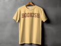 Light yellow t-shirt with the word "BOOKISH" in distressed brown collegiate lettering.