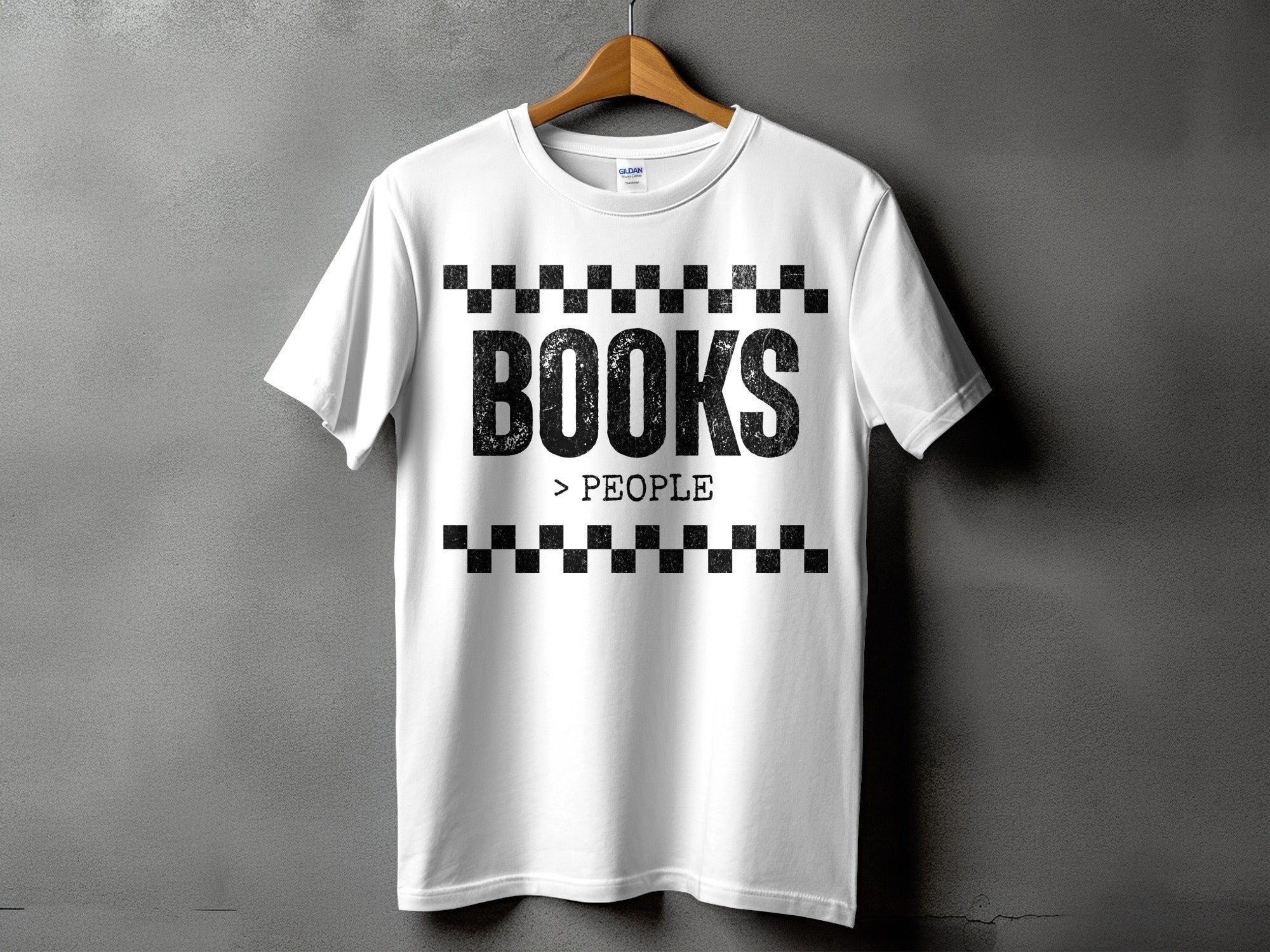 White t-shirt with black text "BOOKS > PEOPLE" and checkered pattern.