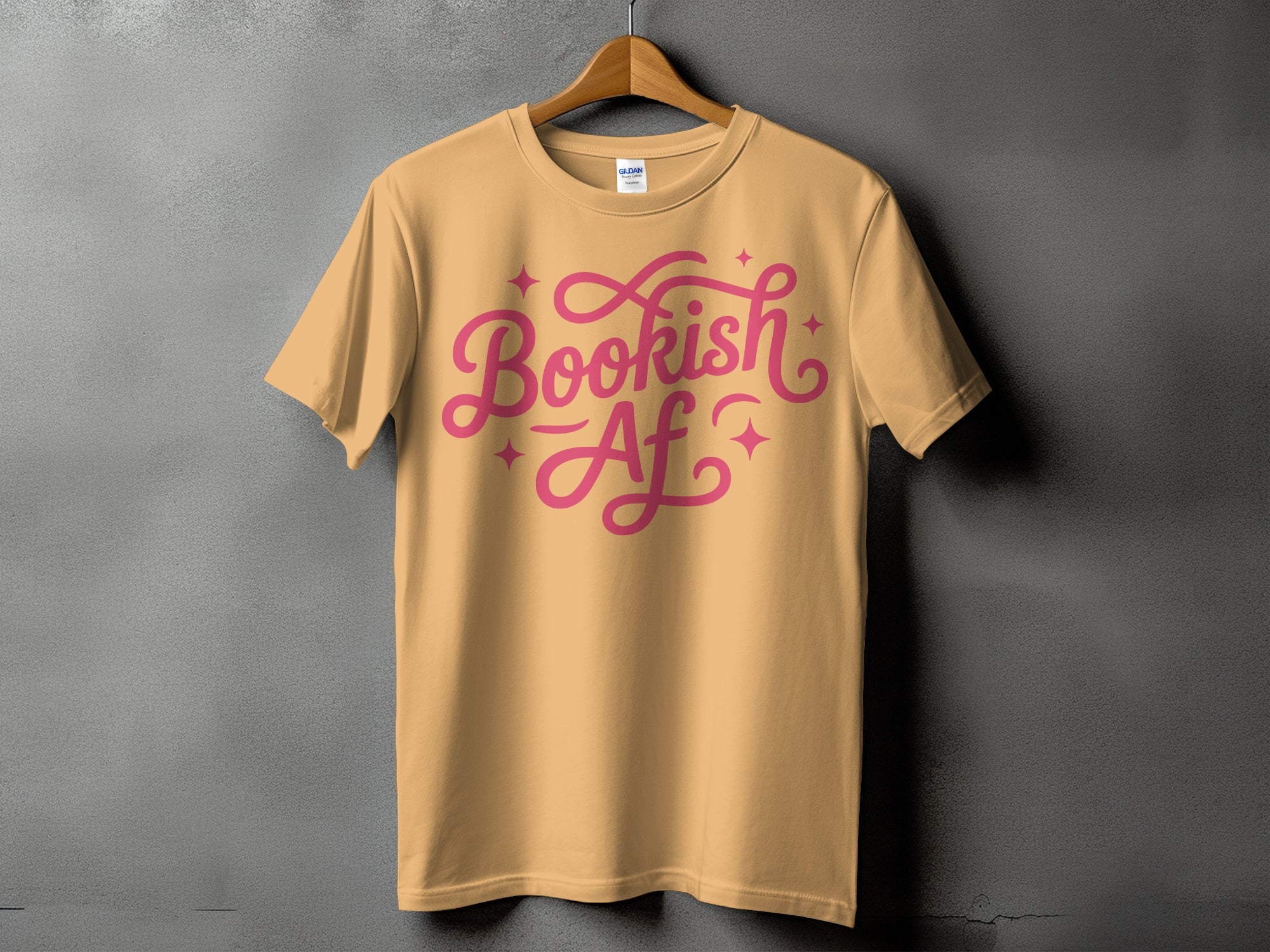 Peach t-shirt with pink "Bookish Af" text and star accents.