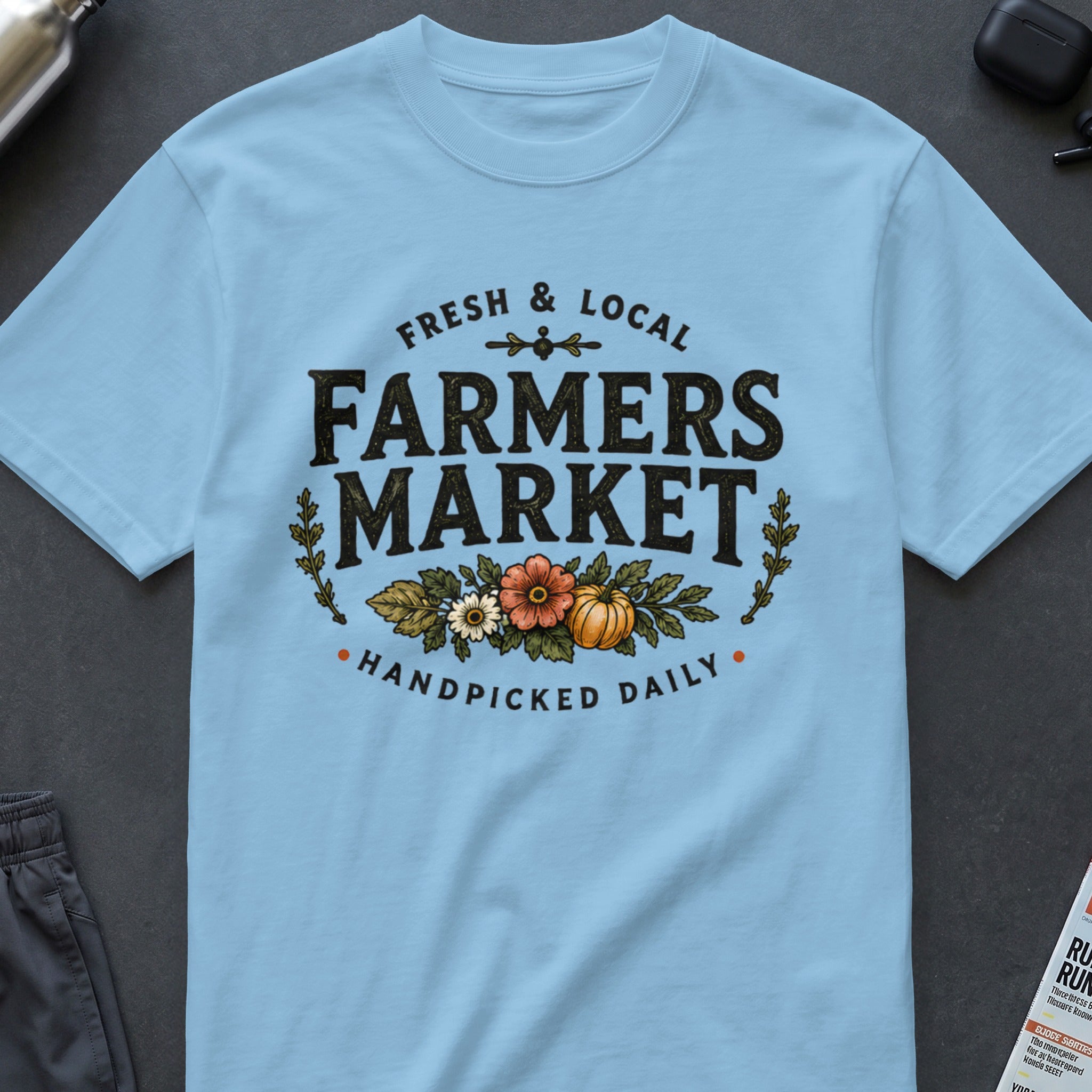 Light blue t-shirt with "Fresh & Local Farmers Market Handpicked Daily" graphic.