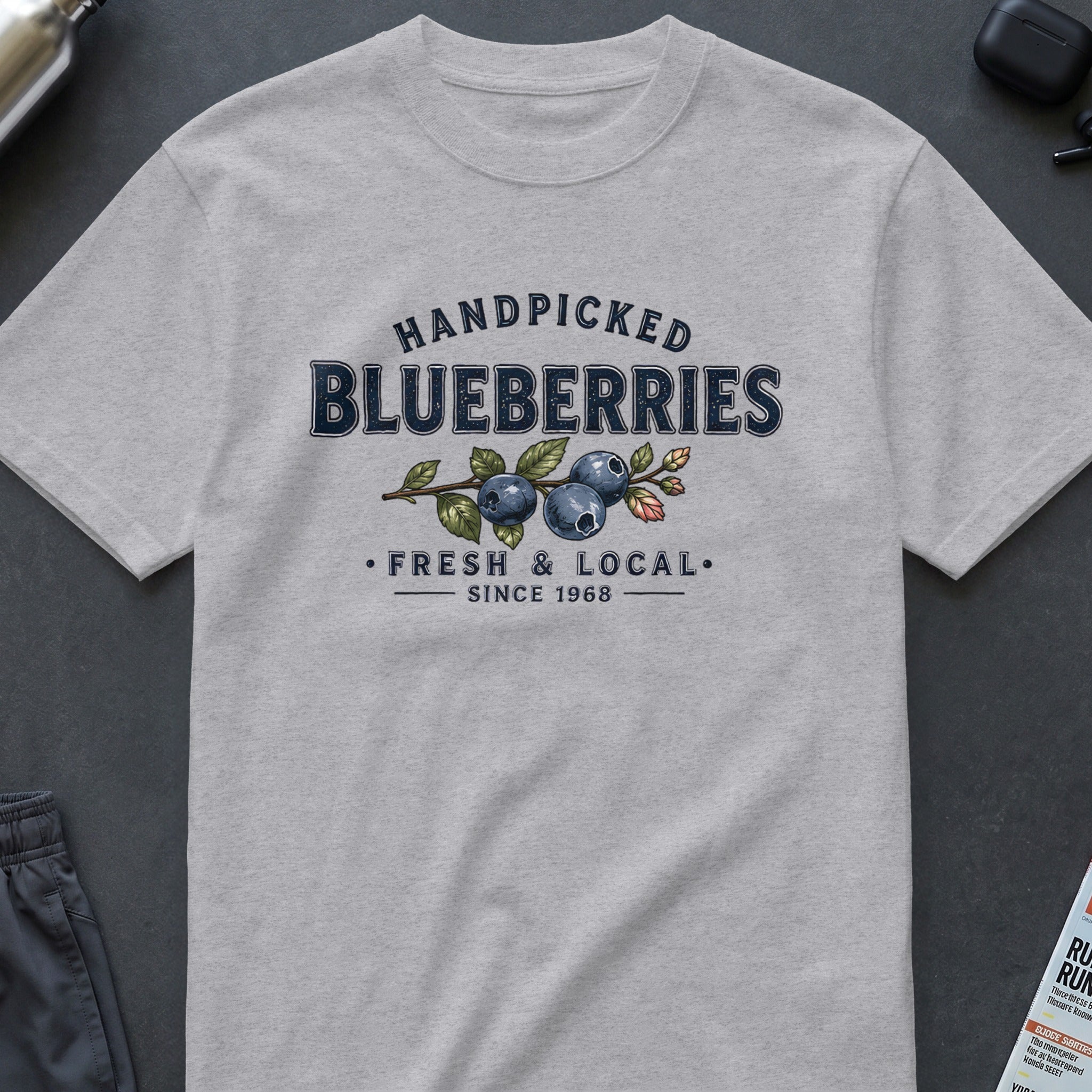 Gray t-shirt with "Handpicked Blueberries Fresh & Local Since 1968" text.
