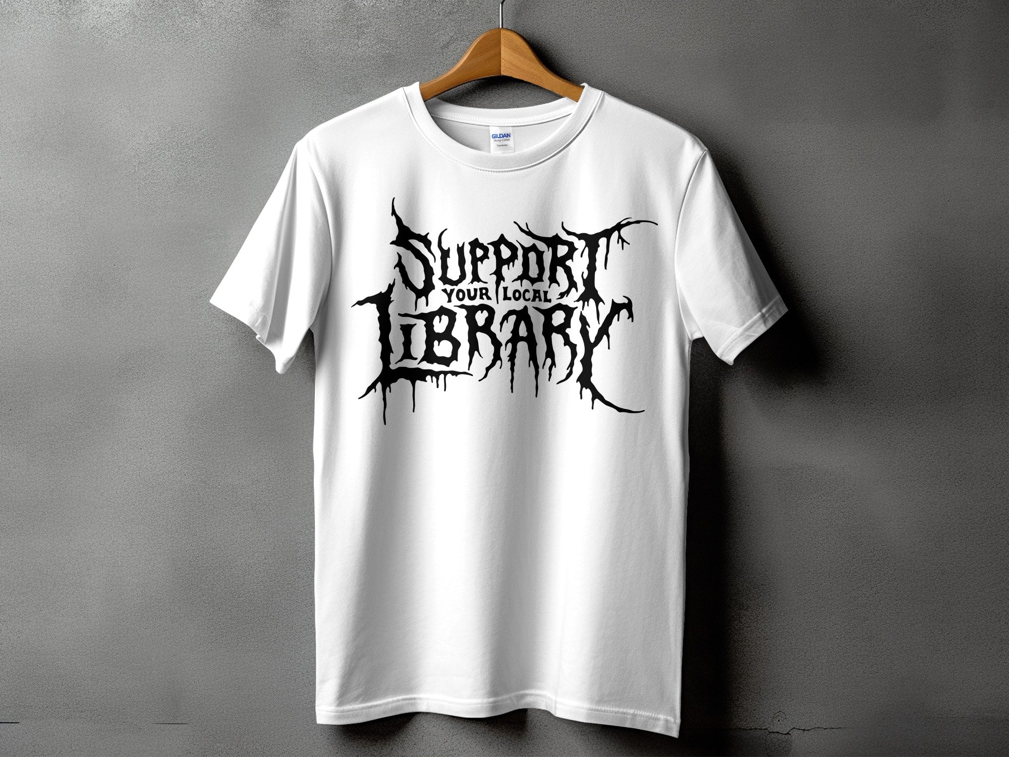 White t-shirt with black dripping text that reads "SUPPORT YOUR LOCAL LIBRARY".