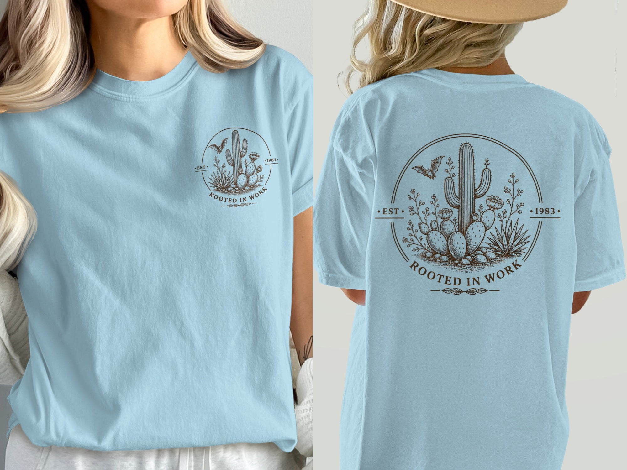 Light blue t-shirt with cactus and bat graphic reading "ROOTED IN WORK EST 1983".