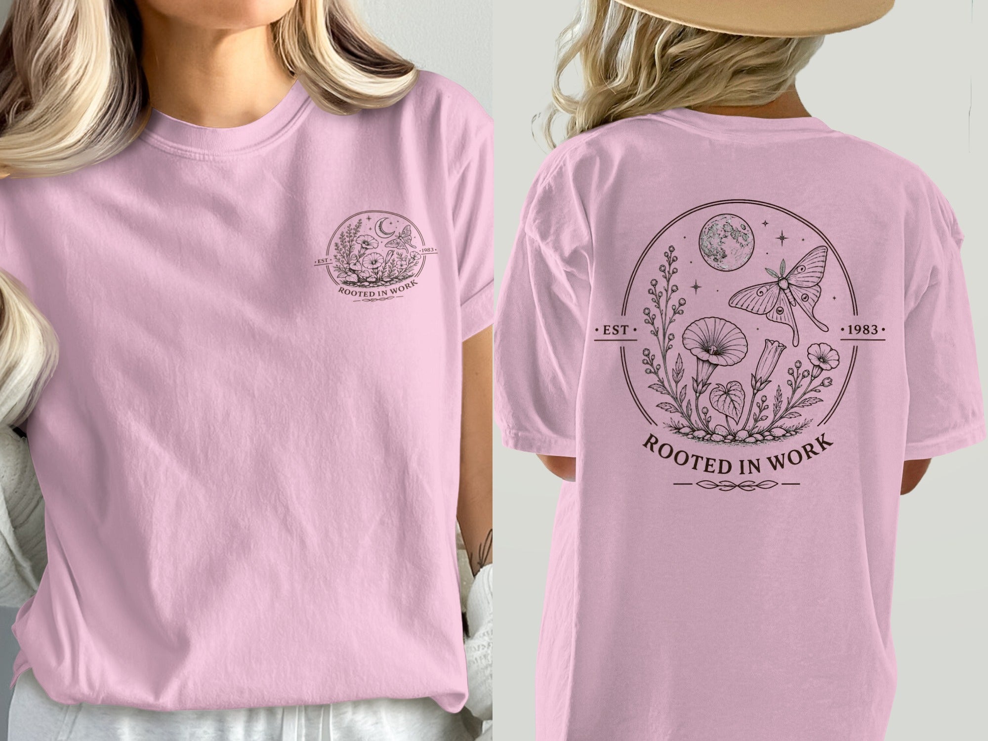Pink t-shirt with a circular botanical graphic featuring moon and moth, and text "ROOTED IN WORK".