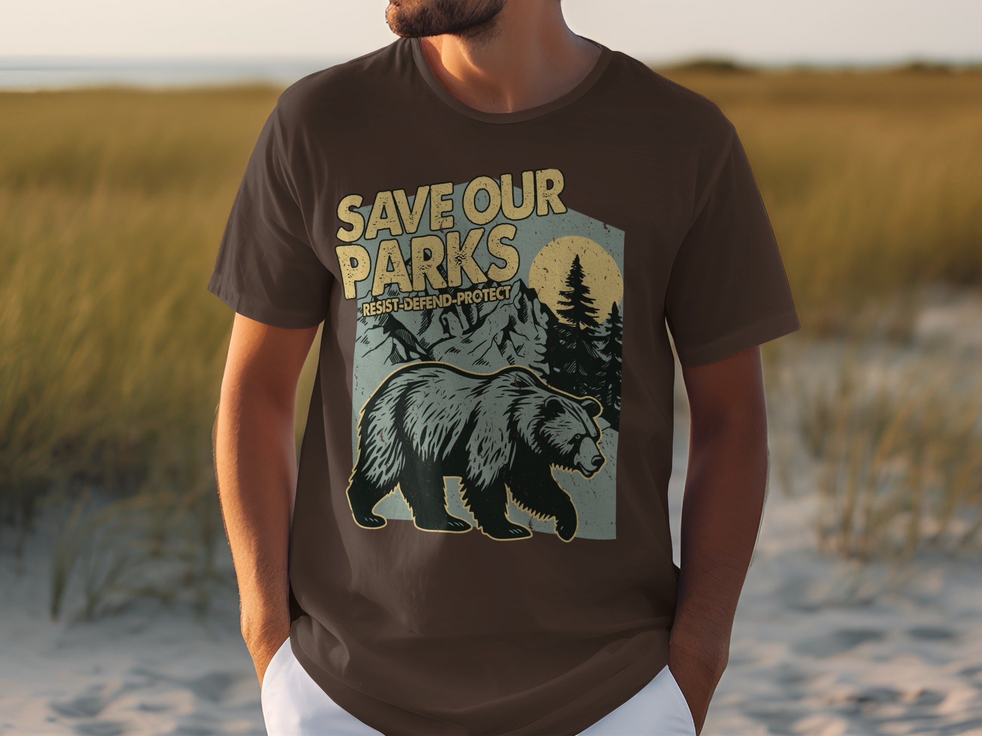 Brown t-shirt with graphic of bear and mountains; "Save Our Parks" text.