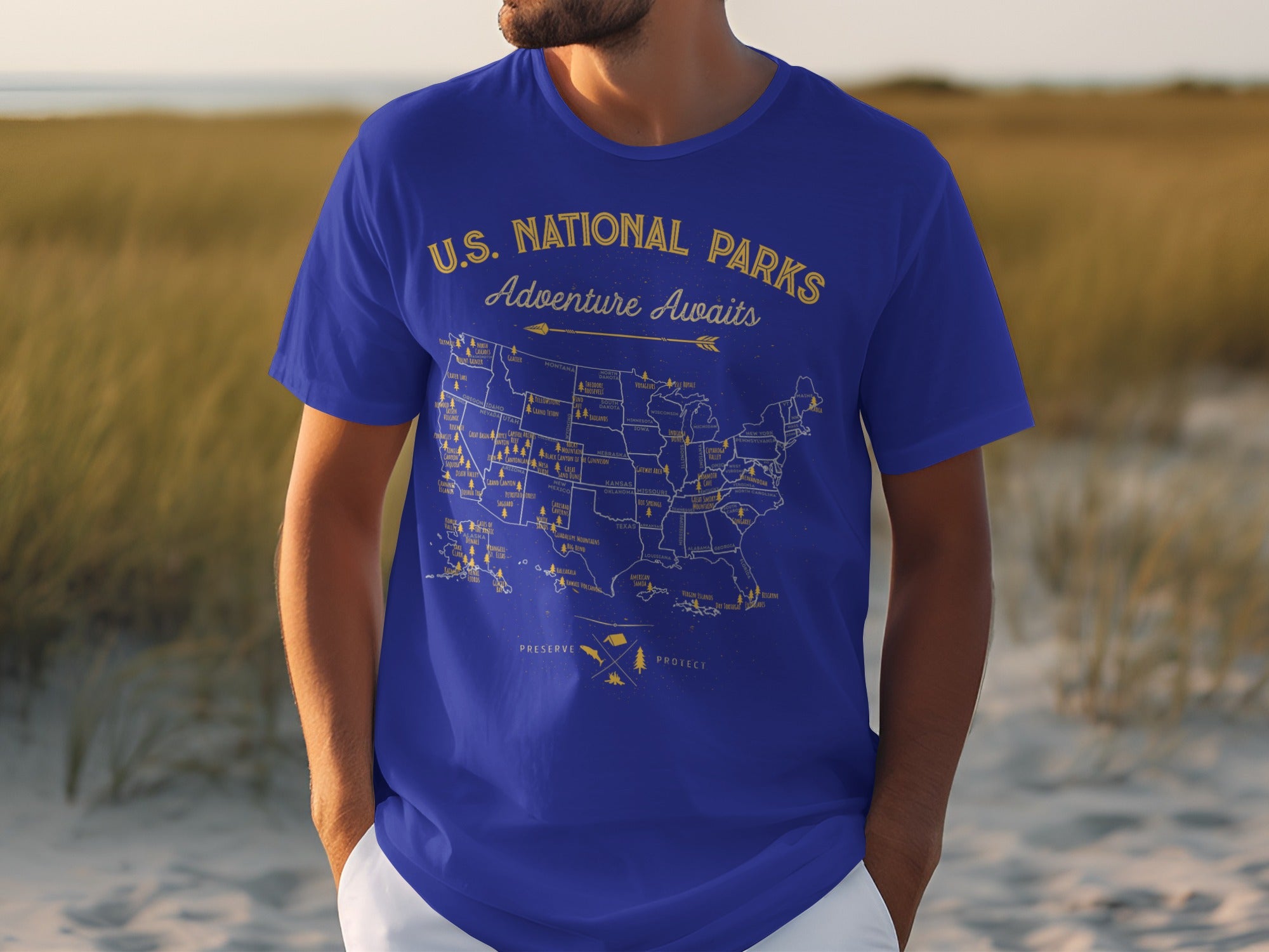 Blue t-shirt with U.S. National Parks map graphic and "Adventure Awaits" text.