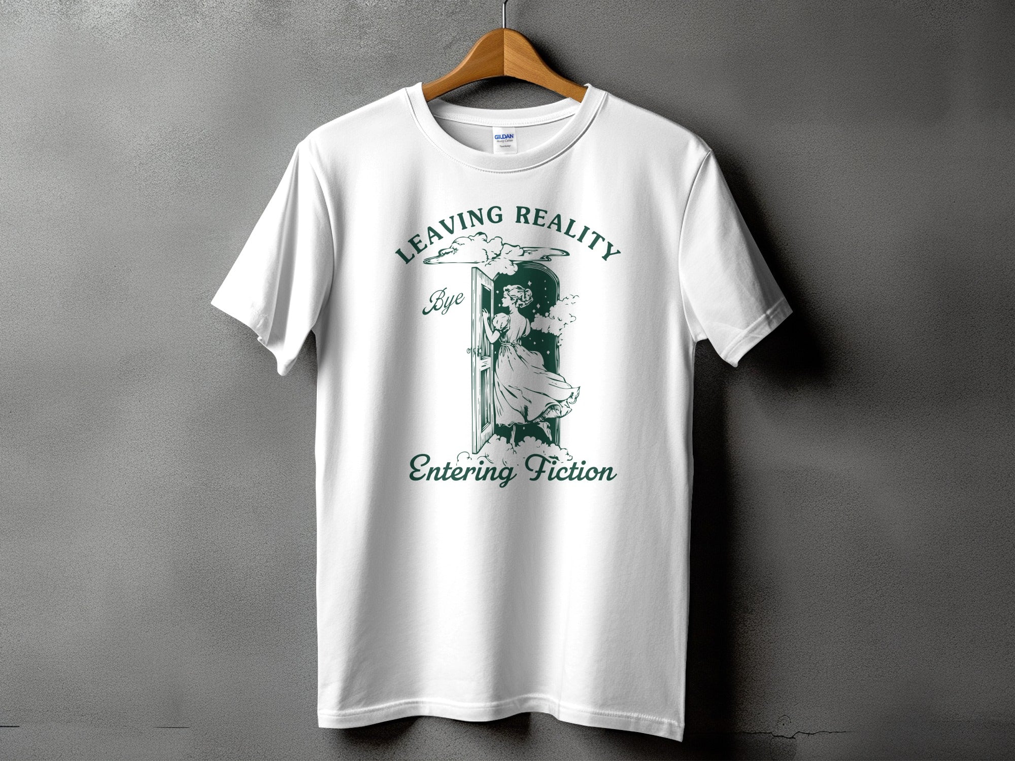 White t-shirt with green text and illustration of a woman exiting a door, "Leaving Reality Bye Entering Fiction".