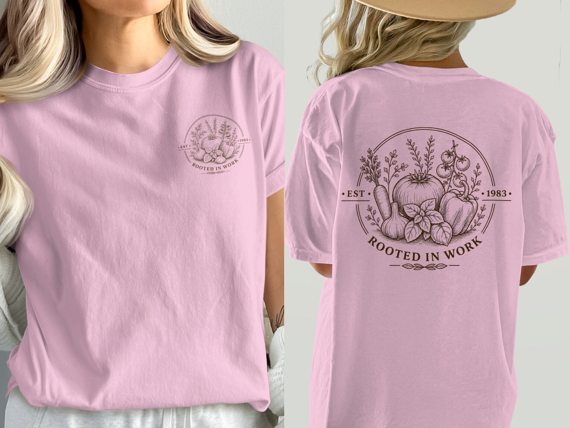 Pink t-shirt with a circular vintage garden motif including vegetables and the text "ROOTED IN WORK 1983".