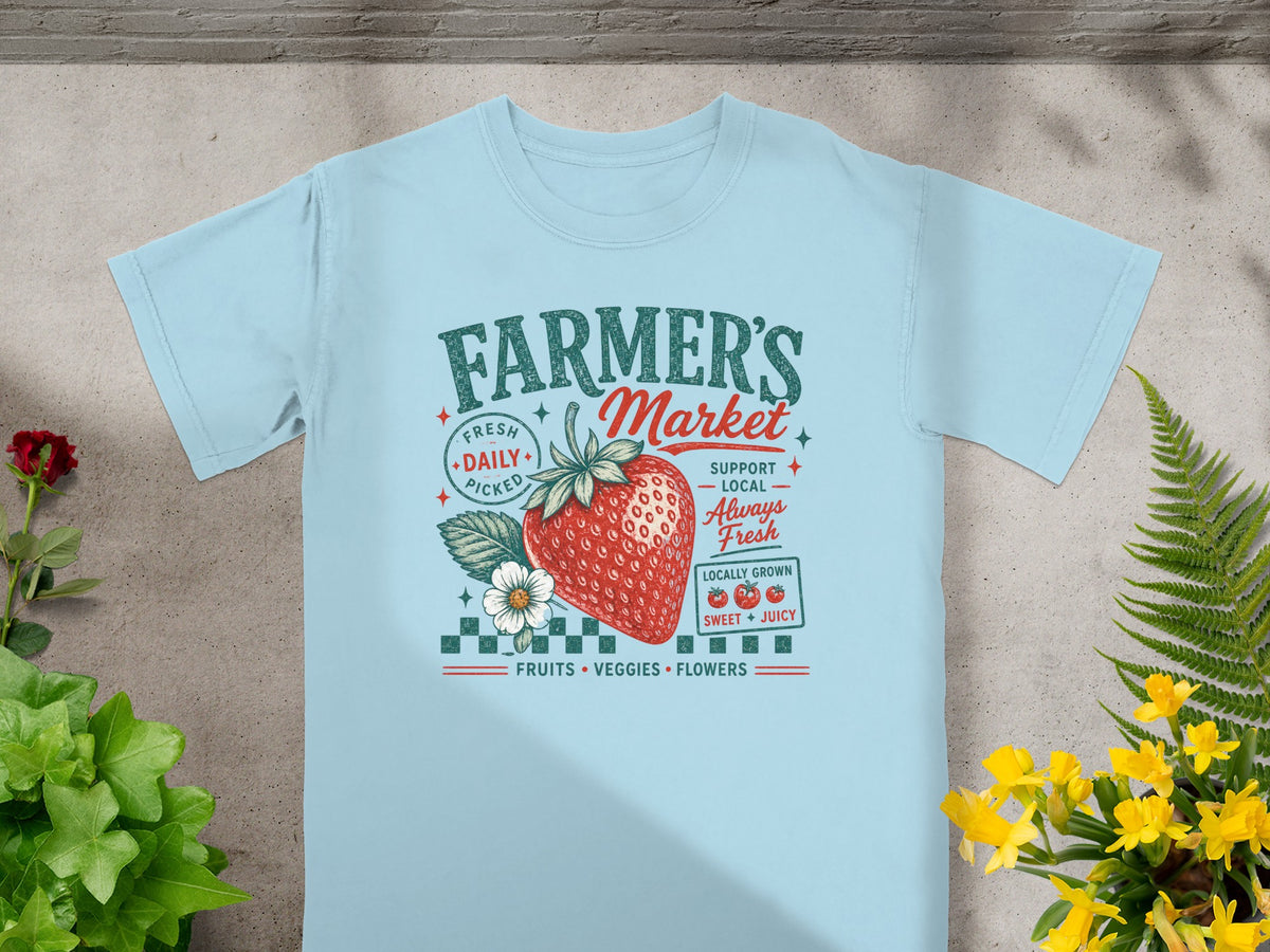Light blue t-shirt with "Farmer's Market" graphic featuring a strawberry and produce.
