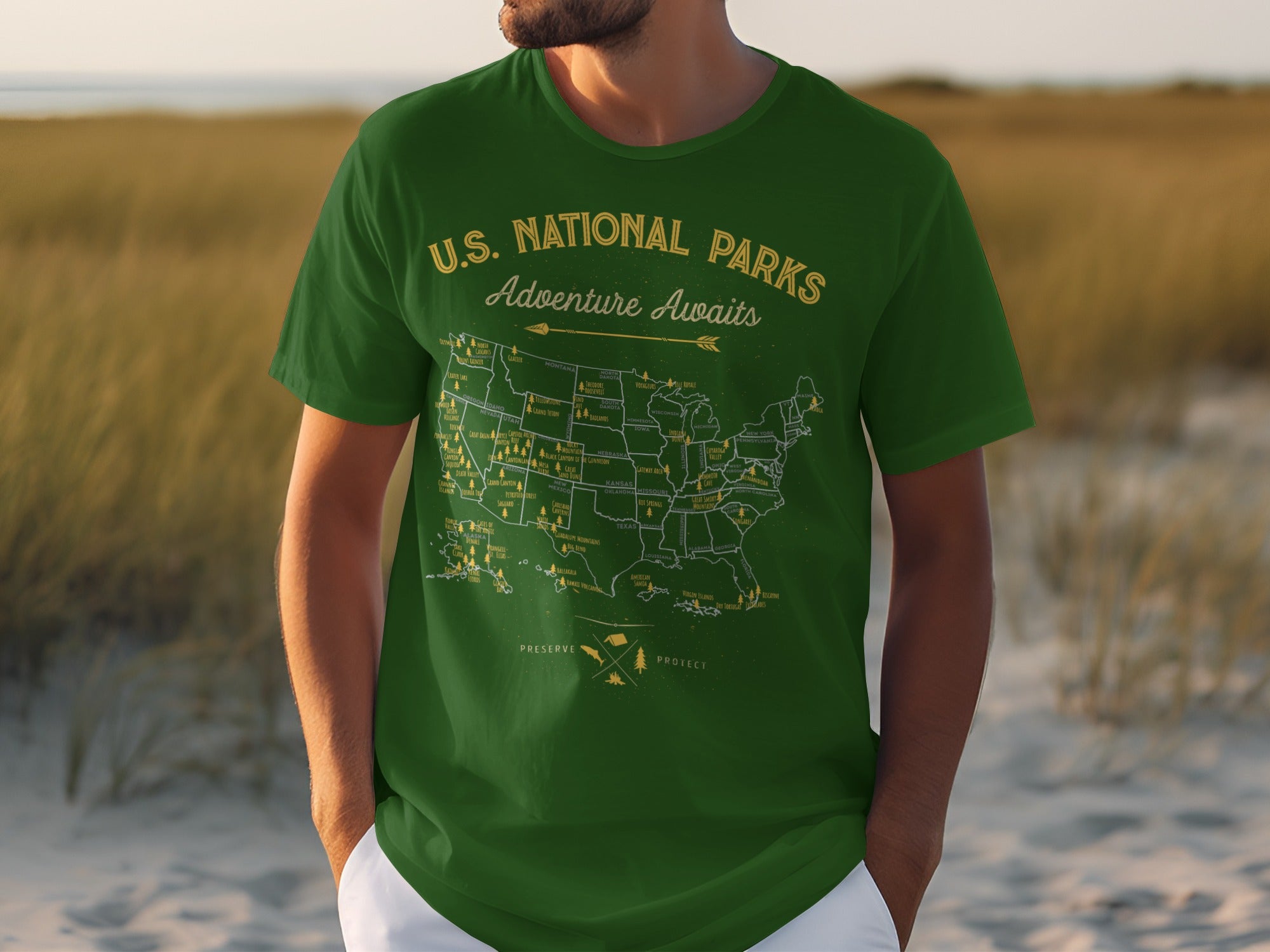 Green t-shirt with U.S. National Parks map and "Adventure Awaits".