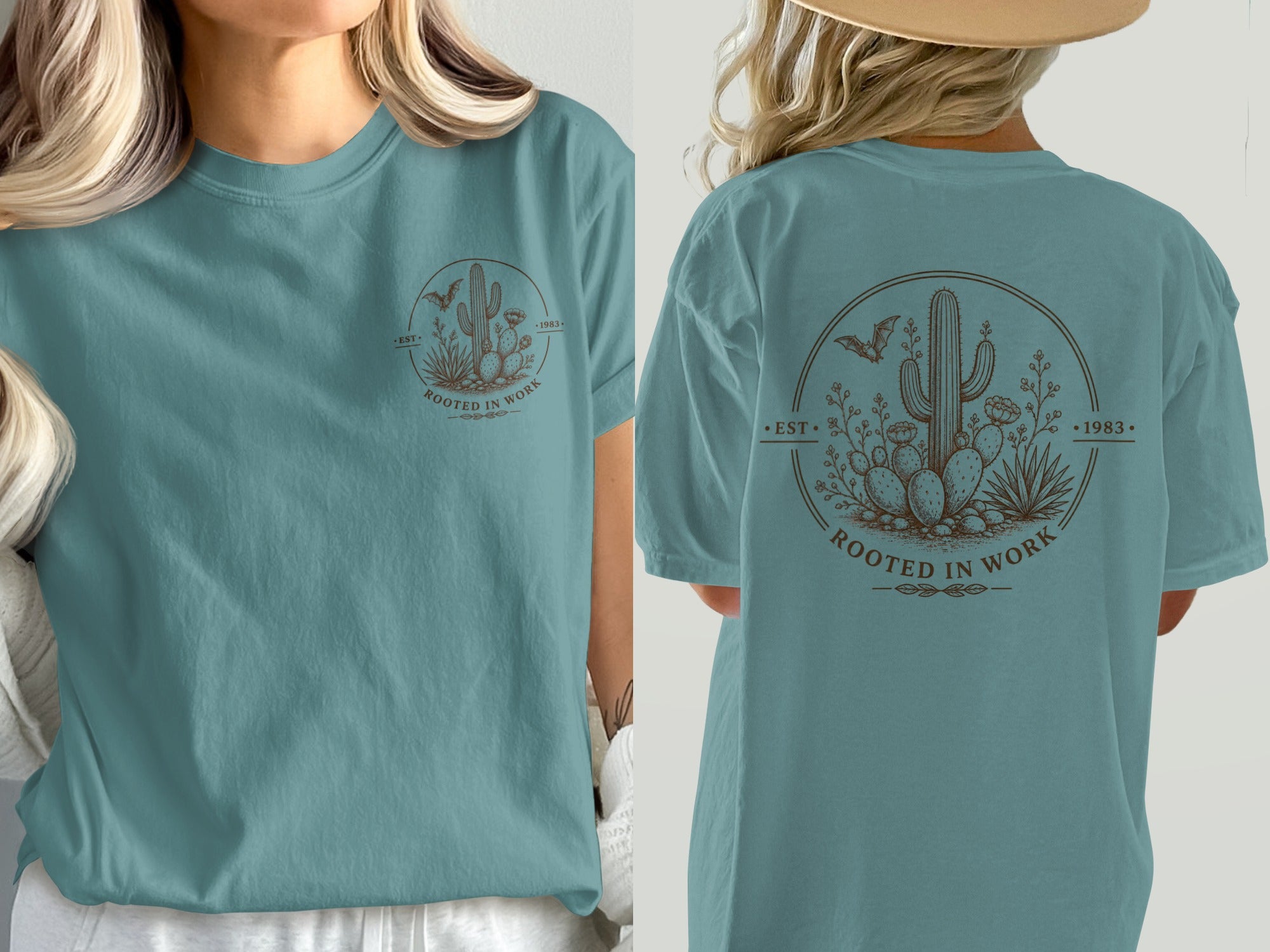Teal t-shirt with a brown circular desert graphic including cactus, bat, and text.