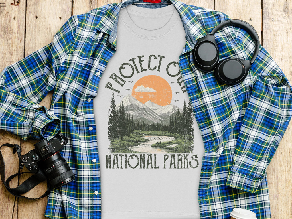 T-shirt with nature graphic and text "PROTECT OUR NATIONAL PARKS."