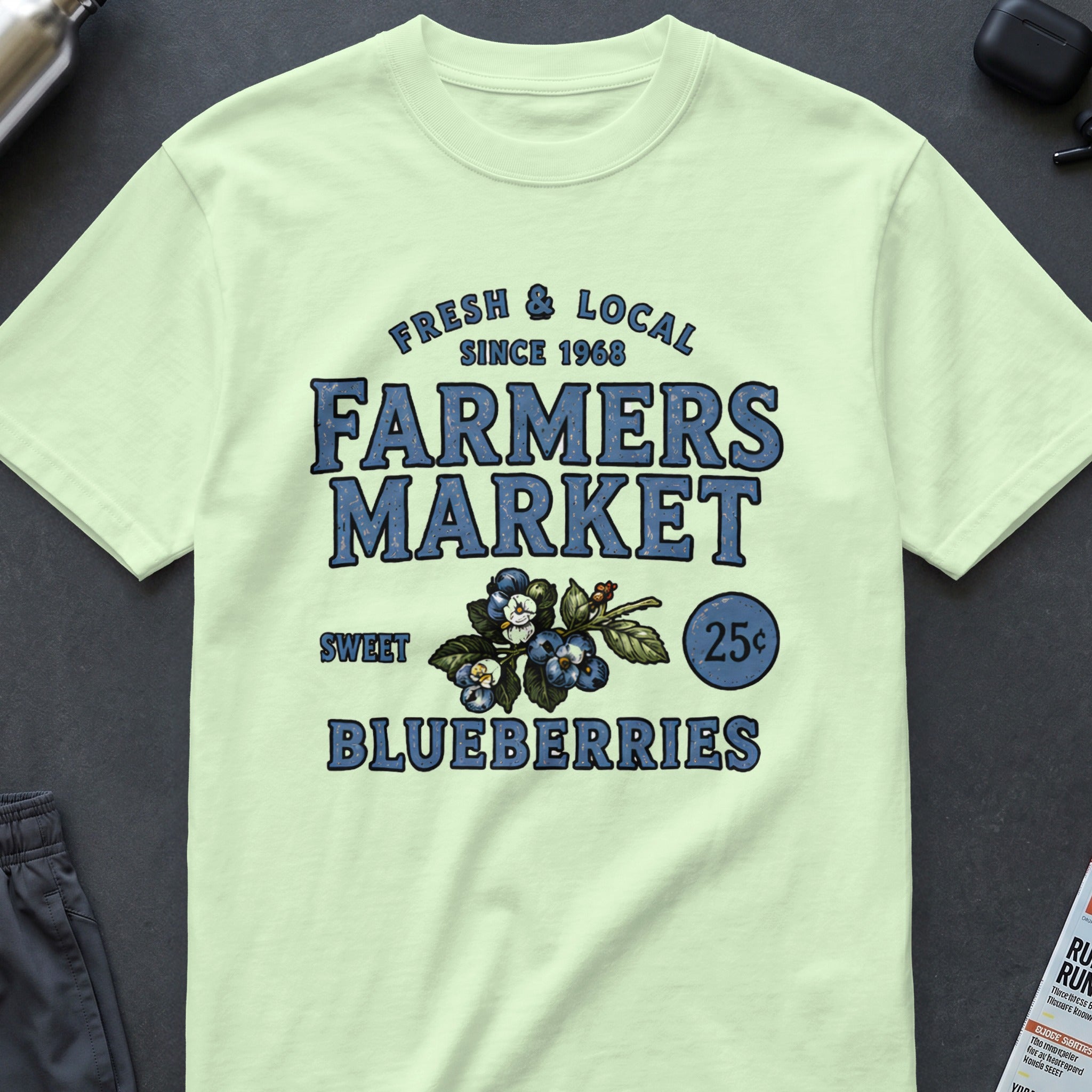 Light green t-shirt with "Fresh & Local Farmers Market" and blueberries design.